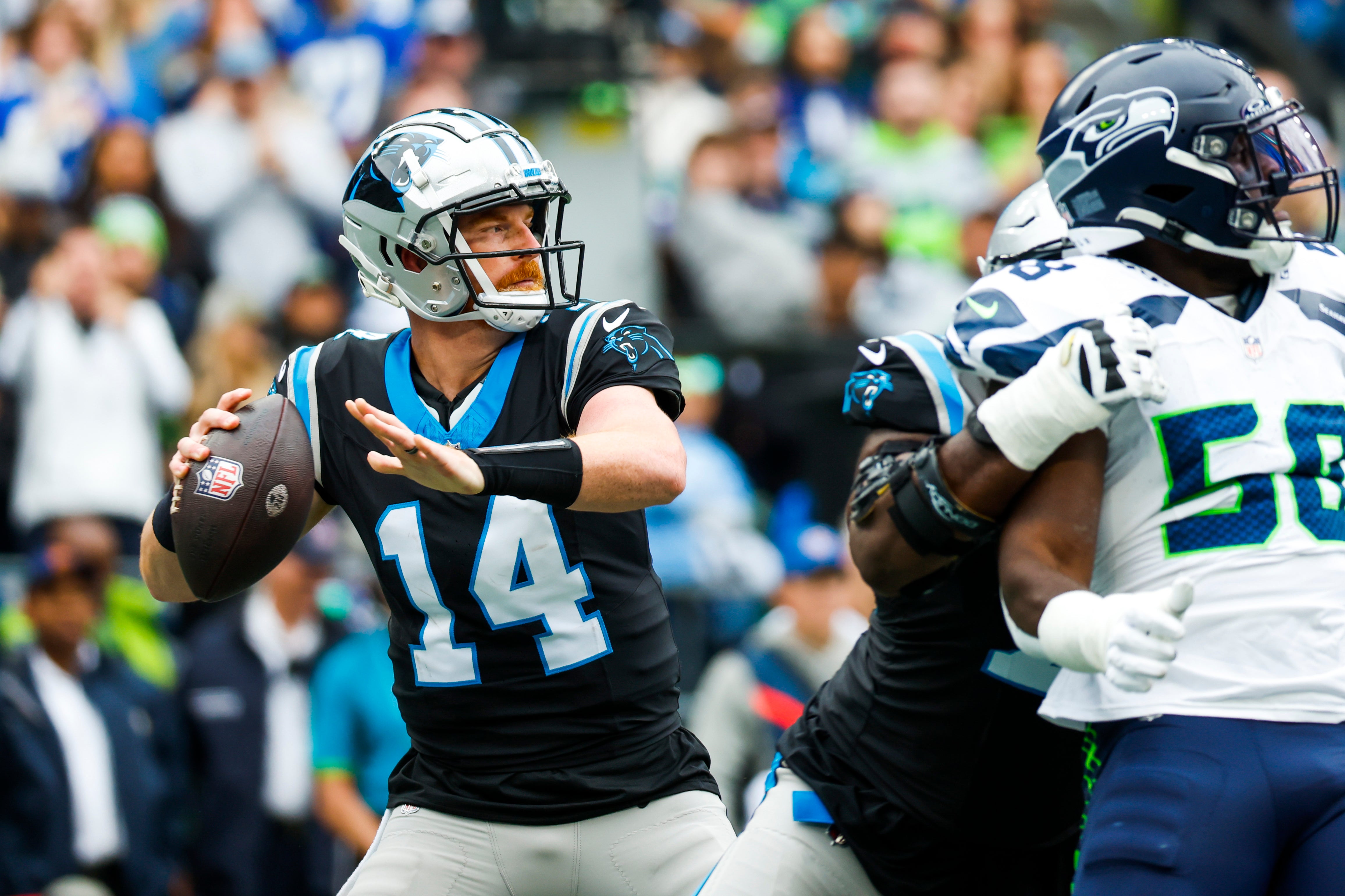 Sep 24, 2023; Seattle, Washington, USA; Carolina Panthers quarterback Andy Dalton (14) passes against the Seattle Seahawks during the second quarter at Lumen Field. Mandatory Credit: Joe Nicholson-USA TODAY Sports