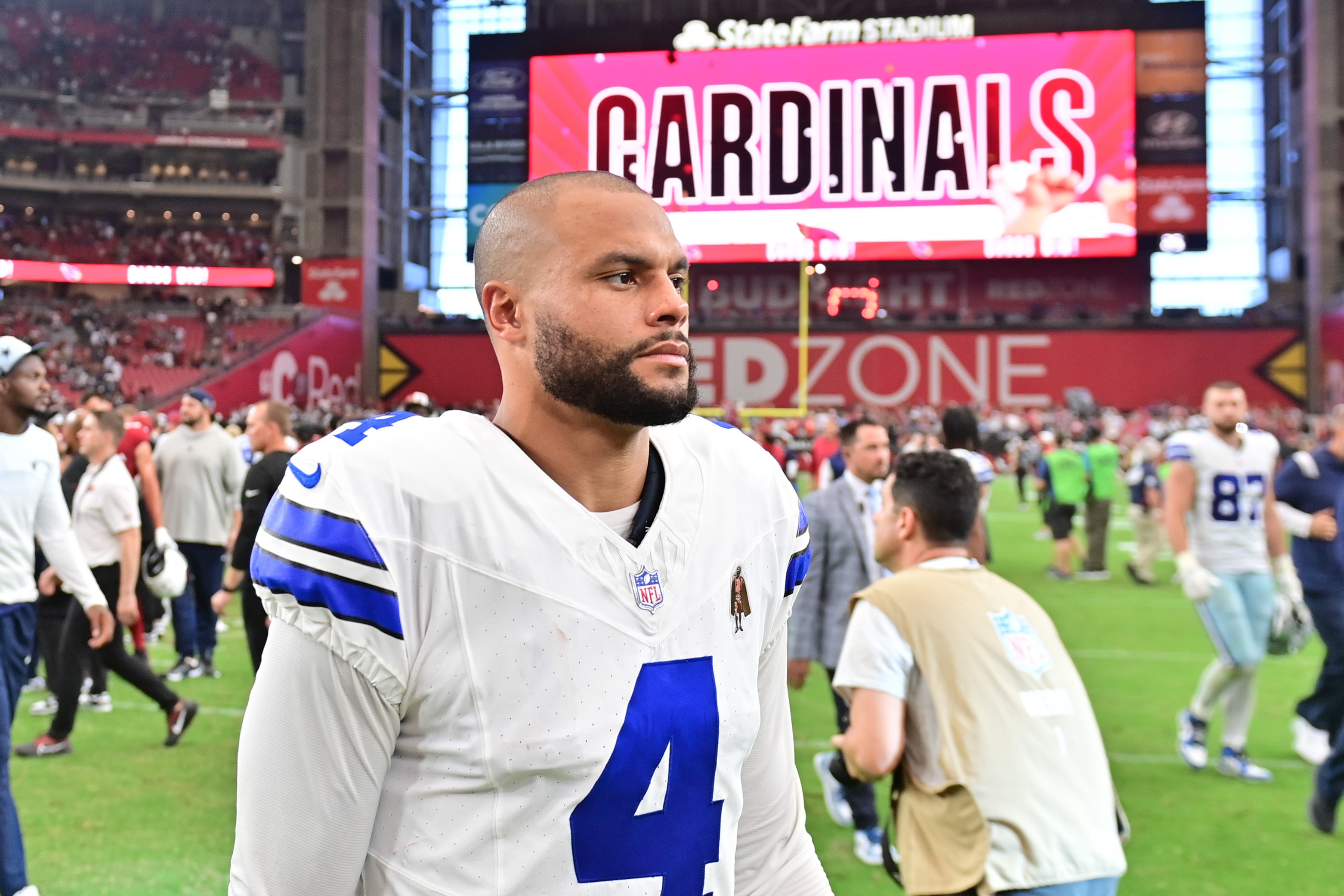  Dallas Cowboys quarterback Dak Prescott (4) reacts after losing to the Arizona Cardinals at State Farm Stadium. Mandatory Credit: Matt Kartozian-USA TODAY Sports