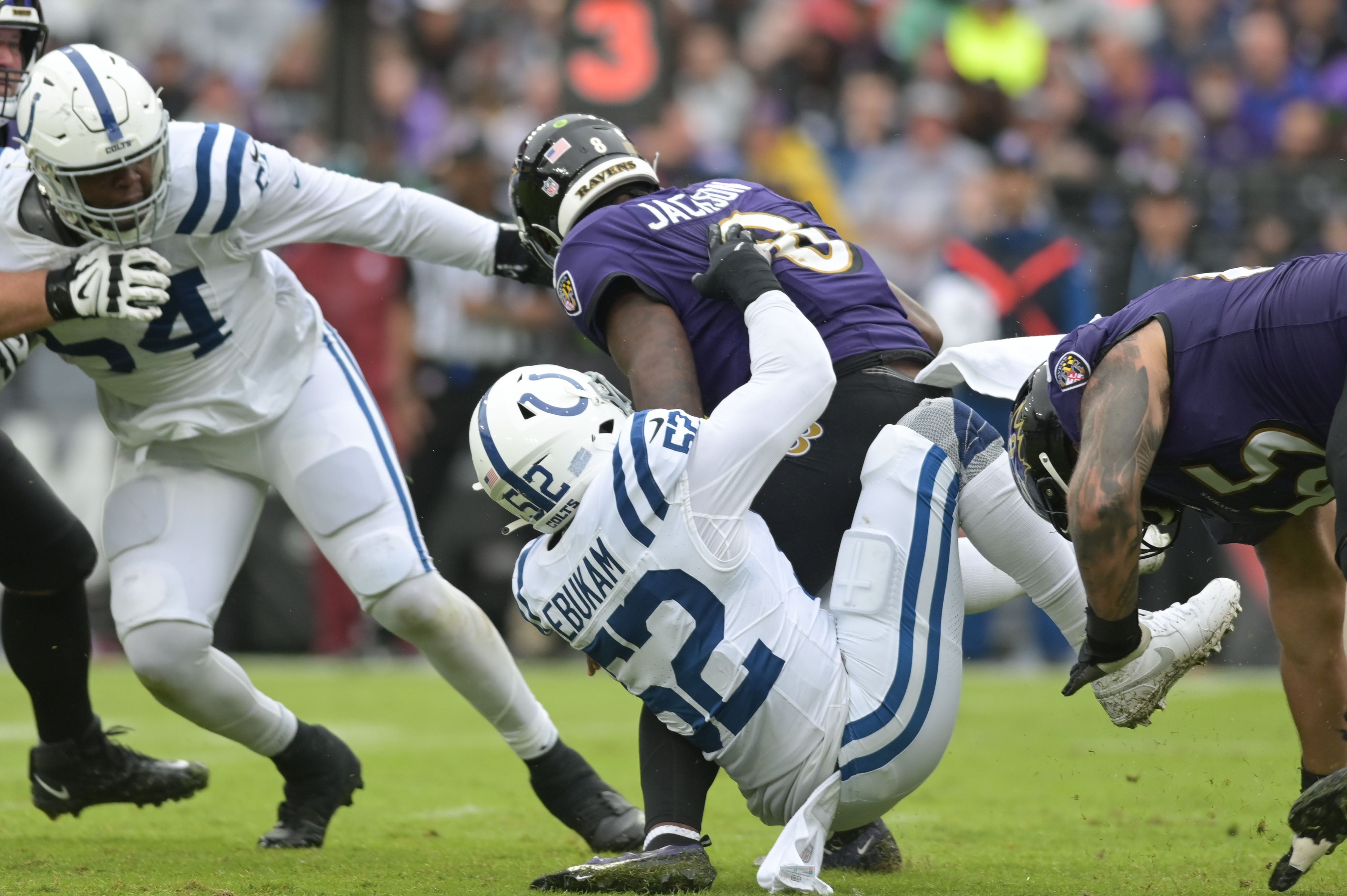 Sep 24, 2023; Baltimore, Maryland, USA; Indianapolis Colts defensive end Samson Ebukam (52) sacks Baltimore Ravens quarterback Lamar Jackson (8) during the first half at M&T Bank Stadium.