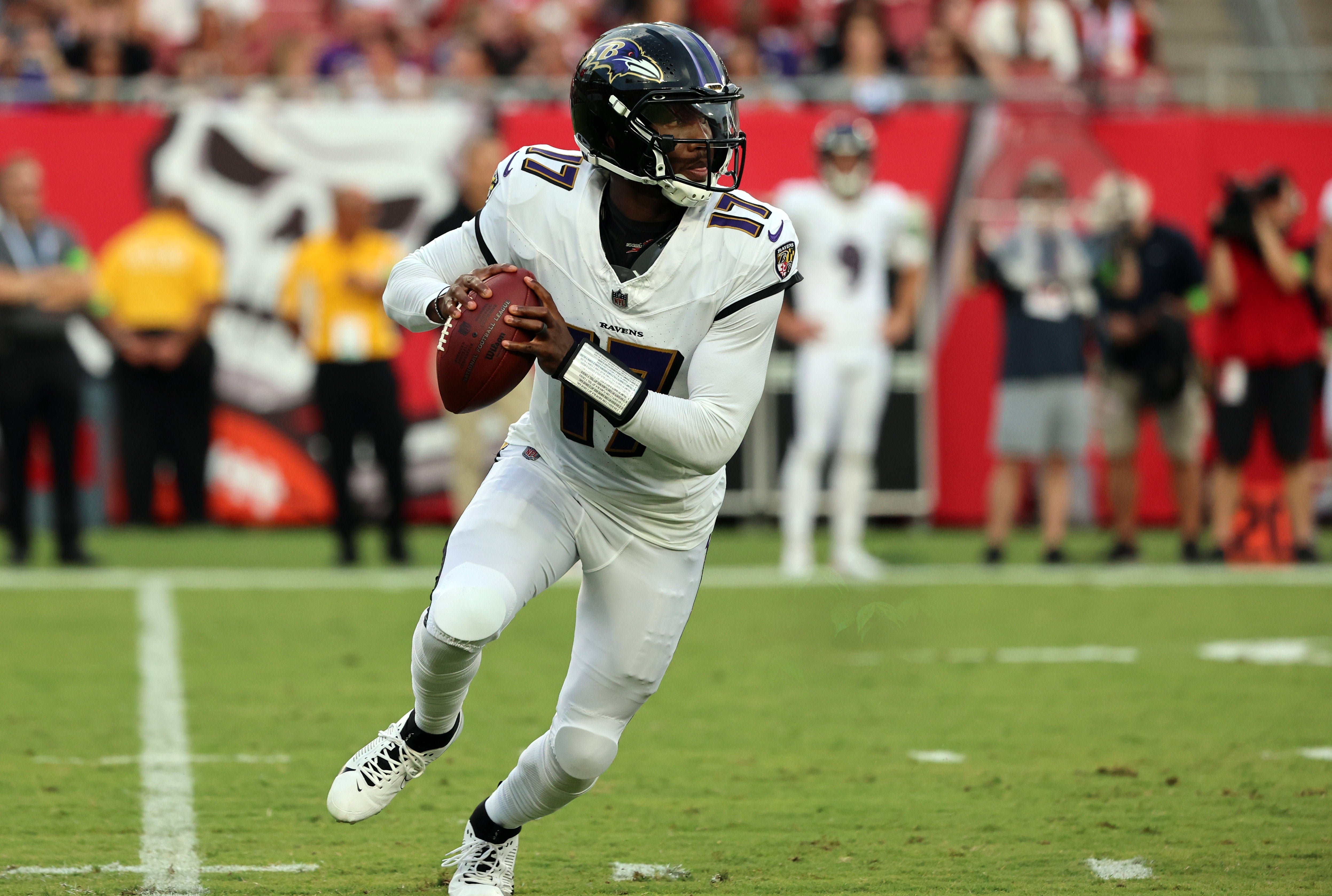 Aug 26, 2023; Tampa, Florida, USA; Baltimore Ravens quarterback Josh Johnson (17) drops back against the Tampa Bay Buccaneers during the first quarter at Raymond James Stadium. Mandatory Credit: Kim Klement Neitzel-USA TODAY Sports