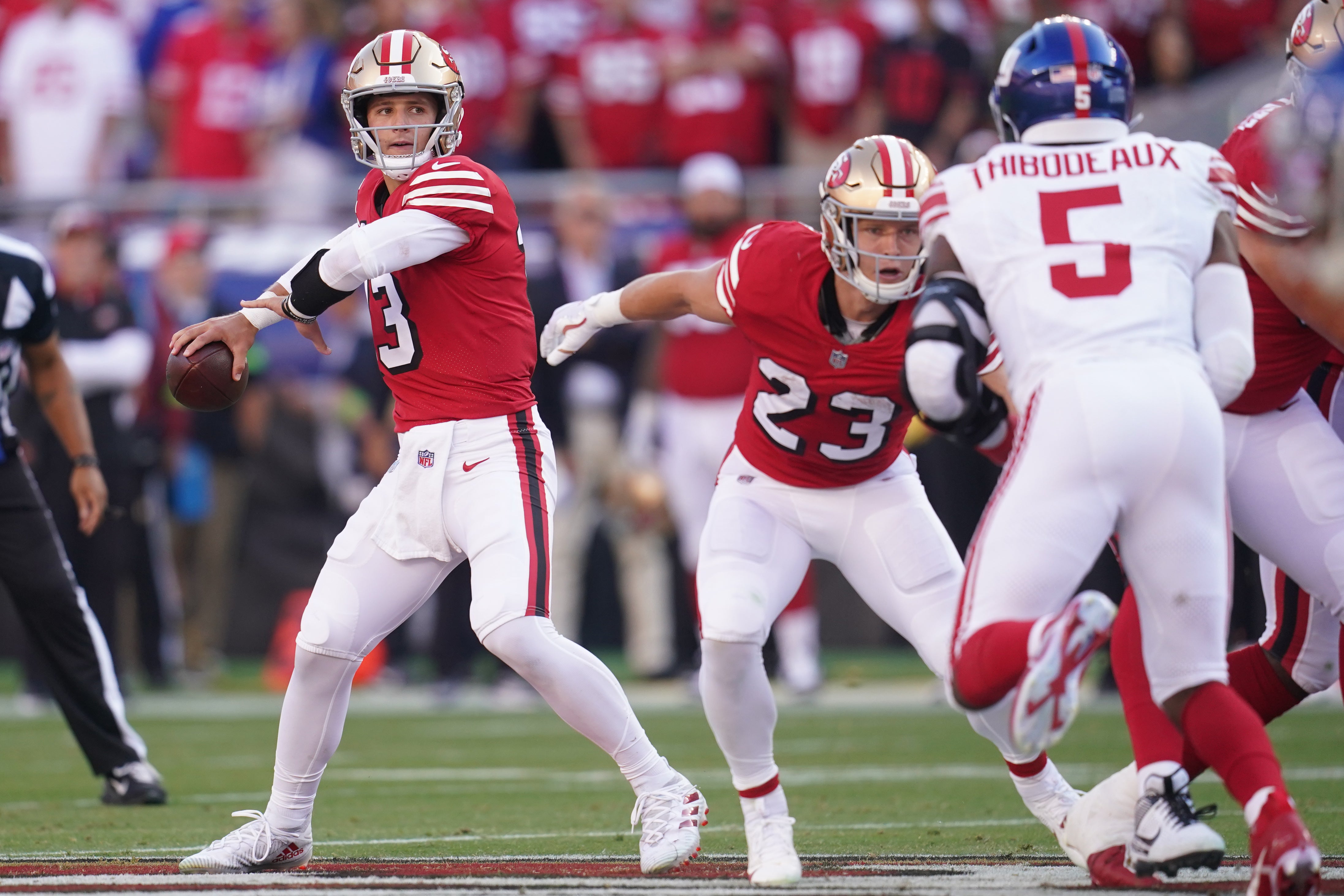 Sep 21, 2023; Santa Clara, California, USA; San Francisco 49ers quarterback Brock Purdy (13) throws a pass against the New York Giants in the first quarter at Levi's Stadium. Mandatory Credit: Cary Edmondson-USA TODAY Sports