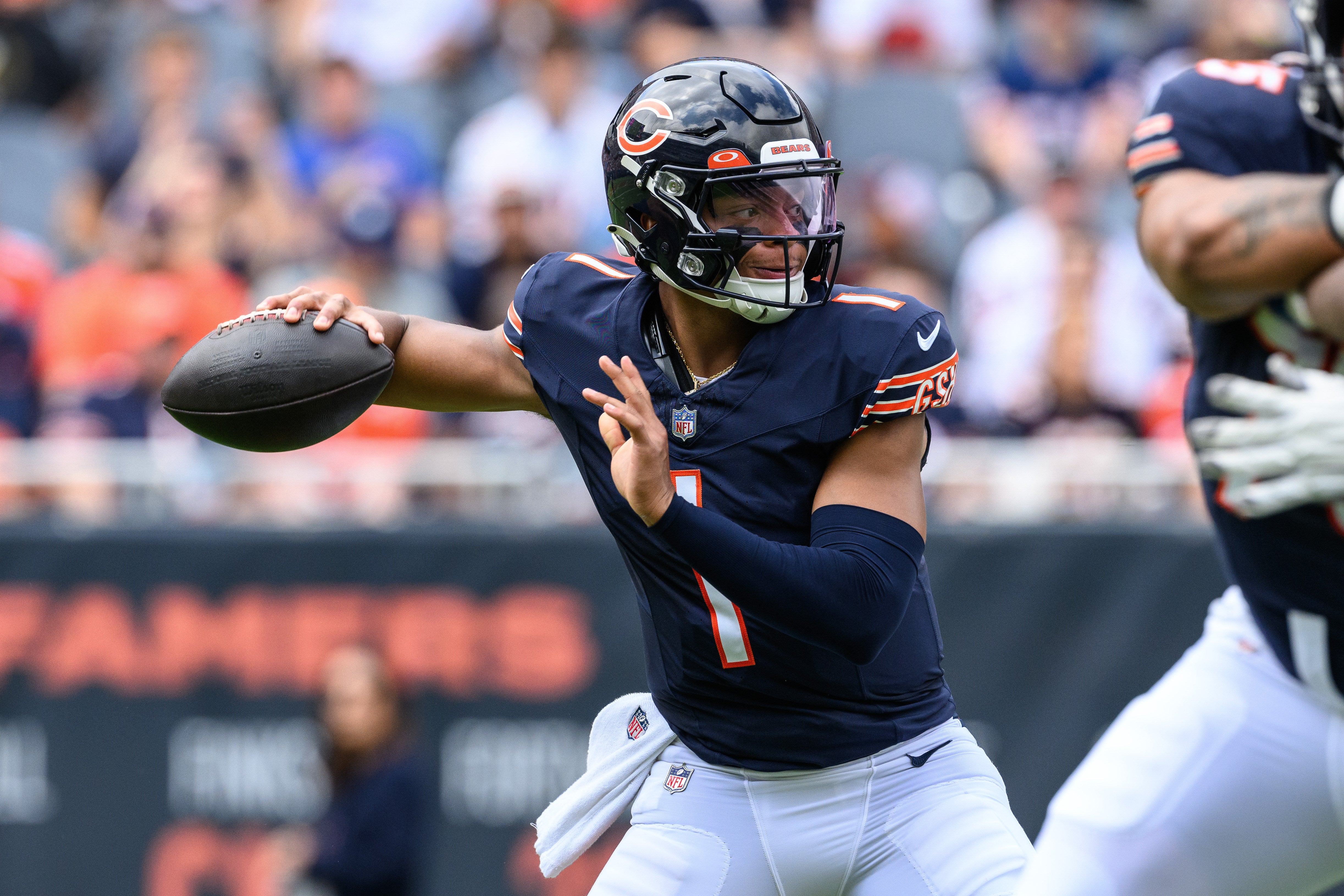 Aug 26, 2023; Chicago, Illinois, USA; Chicago Bears quarterback Justin Fields (1) passes the ball against the Buffalo Bills during the first quarter at Soldier Field. Mandatory Credit: Daniel Bartel-USA TODAY Sports  