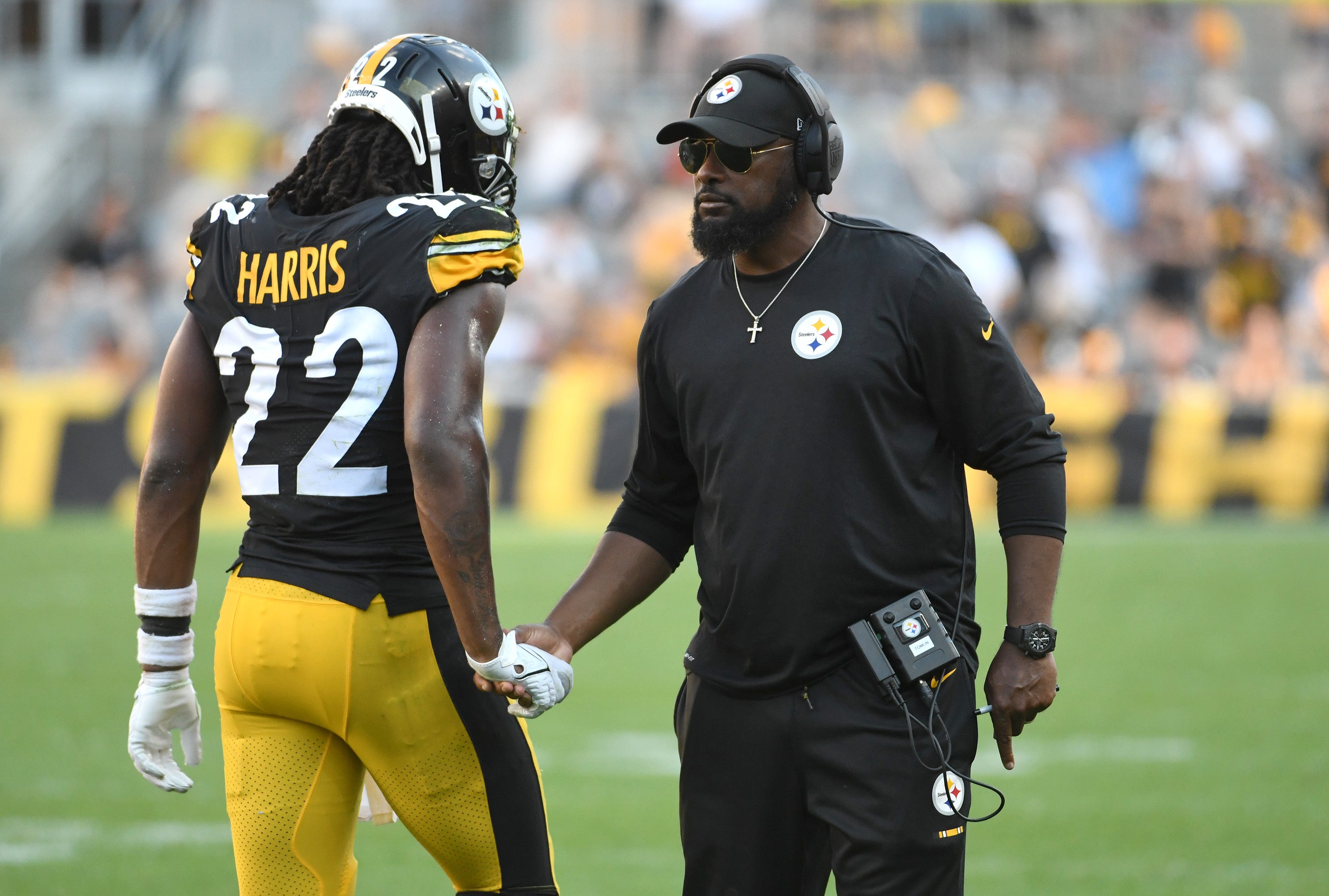 Aug 28, 2022; Pittsburgh, Pennsylvania, USA; Pittsburgh Steelers head coaqch Mike Tomlin greets running back Najee Harris (22) after a sore against the Detroit Lions during the second quarter at Acrisure Stadium. Mandatory Credit: Philip G. Pavely-USA TODAY Sports  