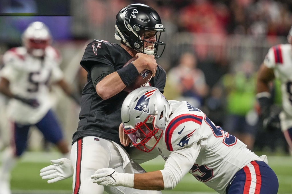 Nov 18, 2021; Atlanta, Georgia, USA; New England Patriots linebacker Kyle Van Noy (53) sacks Atlanta Falcons quarterback Matt Ryan (2) during the first half at Mercedes-Benz Stadium.