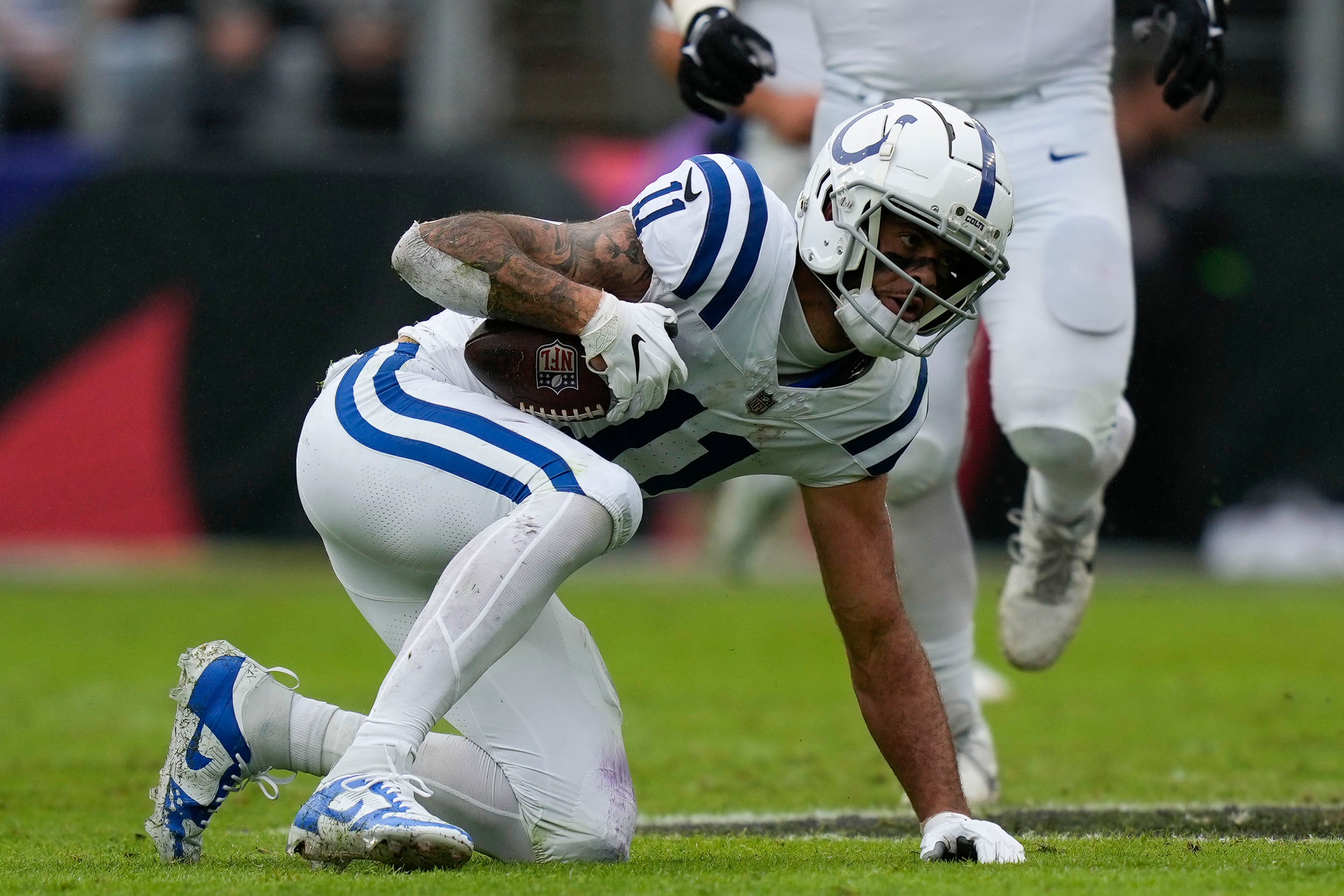 Sep 24, 2023; Baltimore, Maryland, USA; Indianapolis Colts wide receiver Michael Pittman Jr. (11) reacts after catching a pass against the Baltimore Ravens in the first half at M&T Bank Stadium.