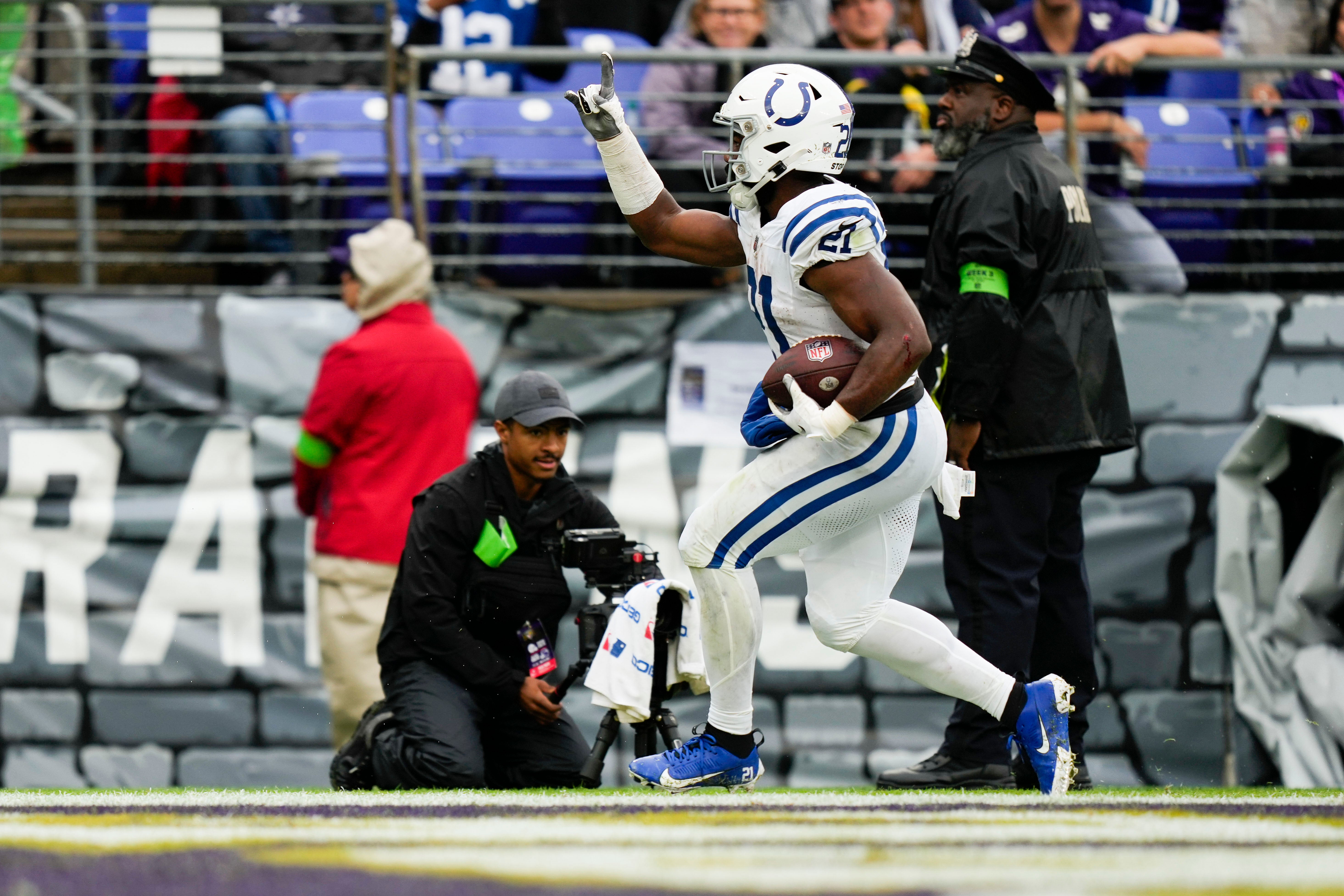 Sep 24, 2023; Baltimore, Maryland, USA; Indianapolis Colts running back Zack Moss (21) reacts after scoring a touchdown against the Baltimore Ravens at M&T Bank Stadium.