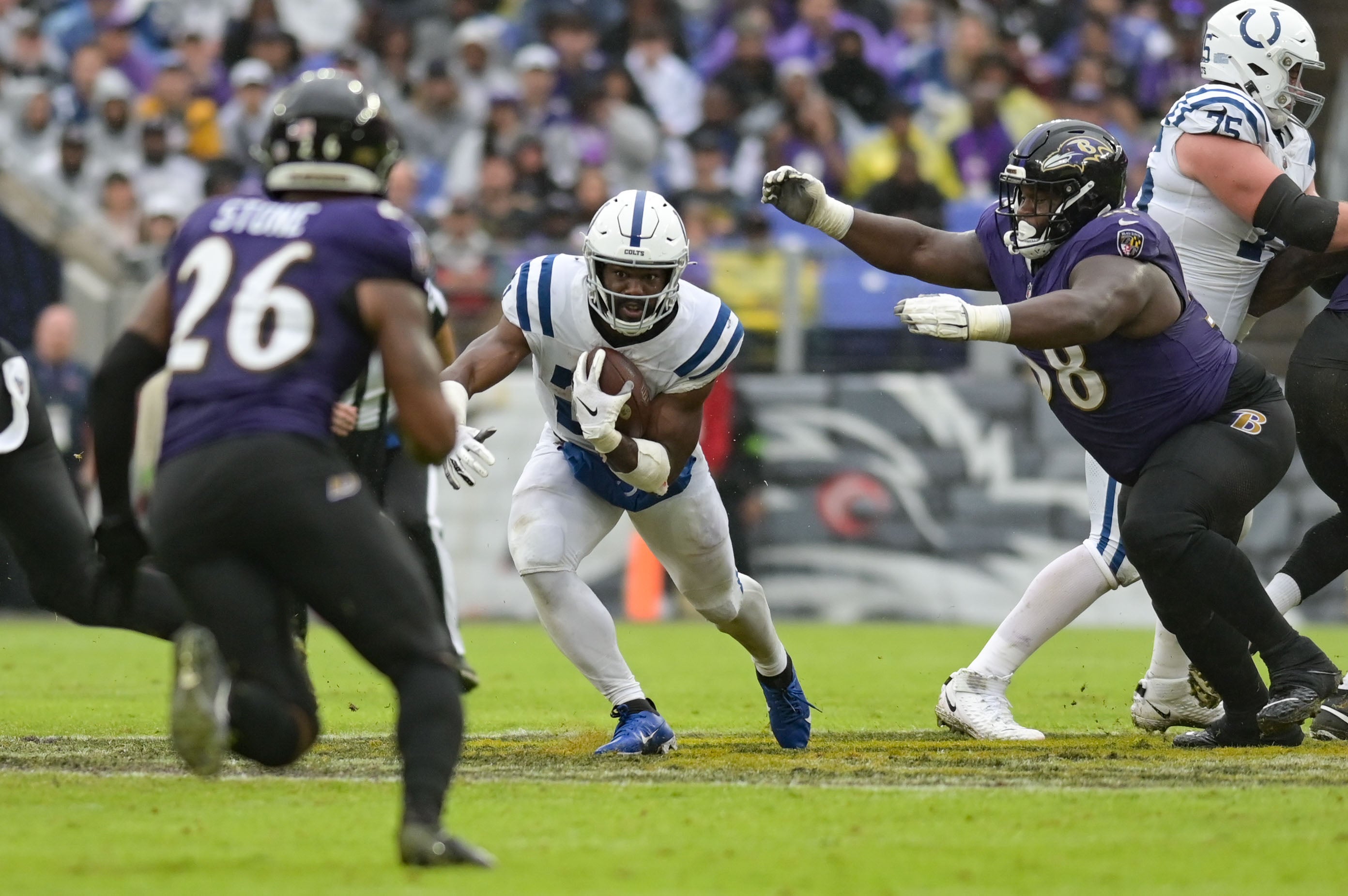 Sep 24, 2023; Baltimore, Maryland, USA; Indianapolis Colts running back Zack Moss (21) rushes during the first half against the Baltimore Ravens at M&T Bank Stadium.