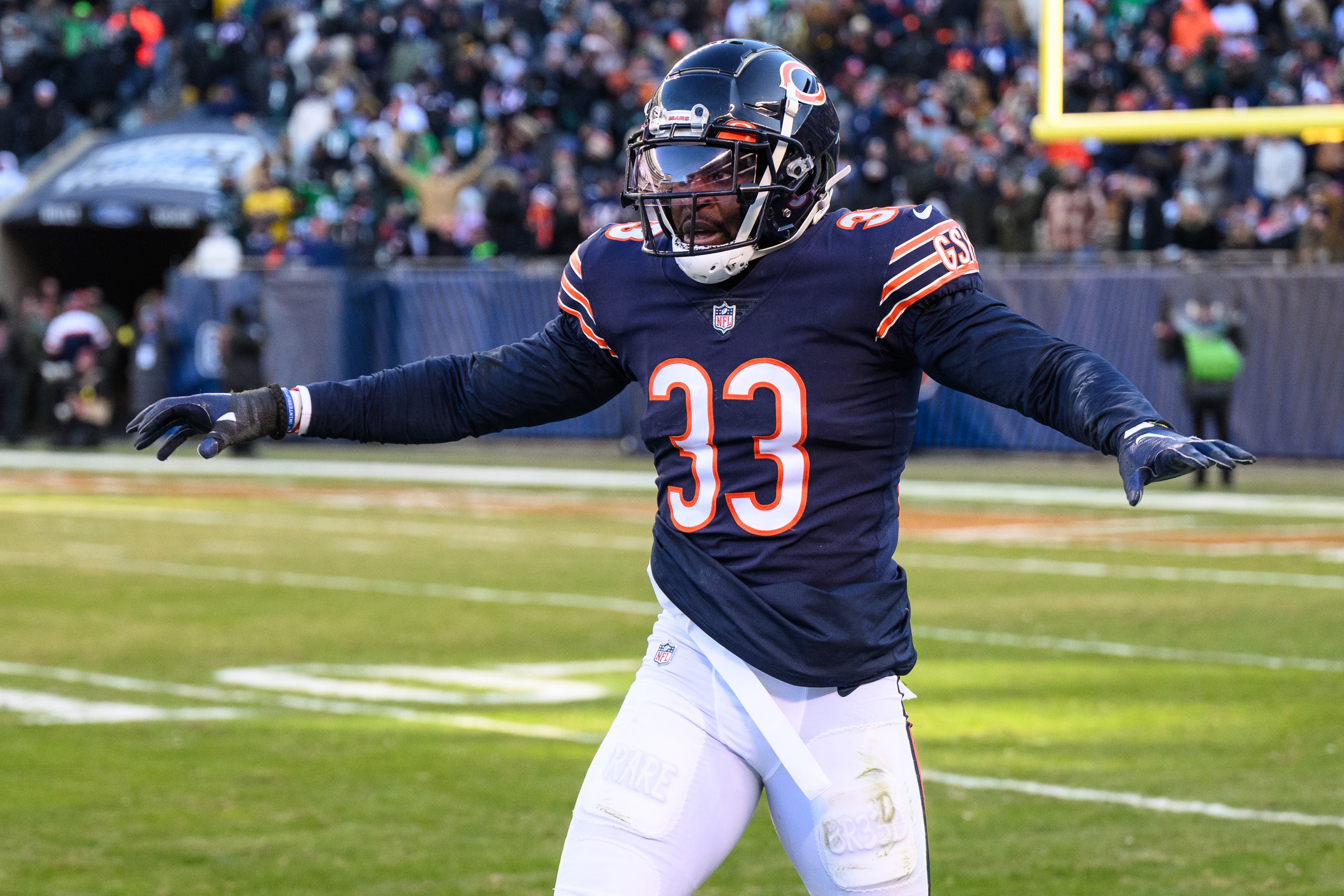 Dec 18, 2022; Chicago, Illinois, USA; Chicago Bears cornerback Jaylon Johnson (33) celebrates a pass breakup in the fourth quarter against the Philadelphia Eagles at Soldier Field.