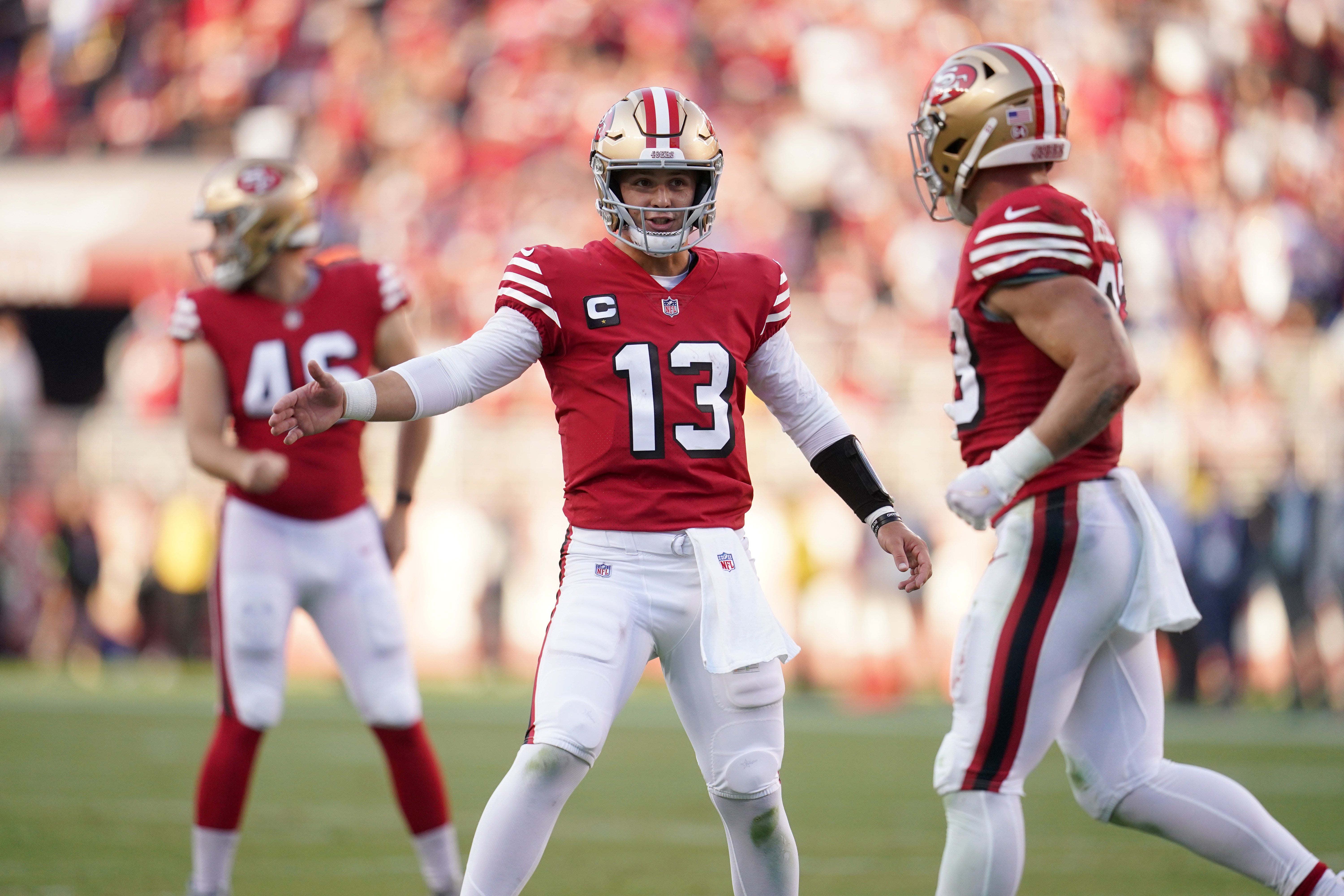 Sep 21, 2023; Santa Clara, California, USA; San Francisco 49ers quarterback Brock Purdy (13) congratulates running back Christian McCaffrey (23) after the 49ers scored a touchdown against the New York Giants in the second quarter at Levi's Stadium.