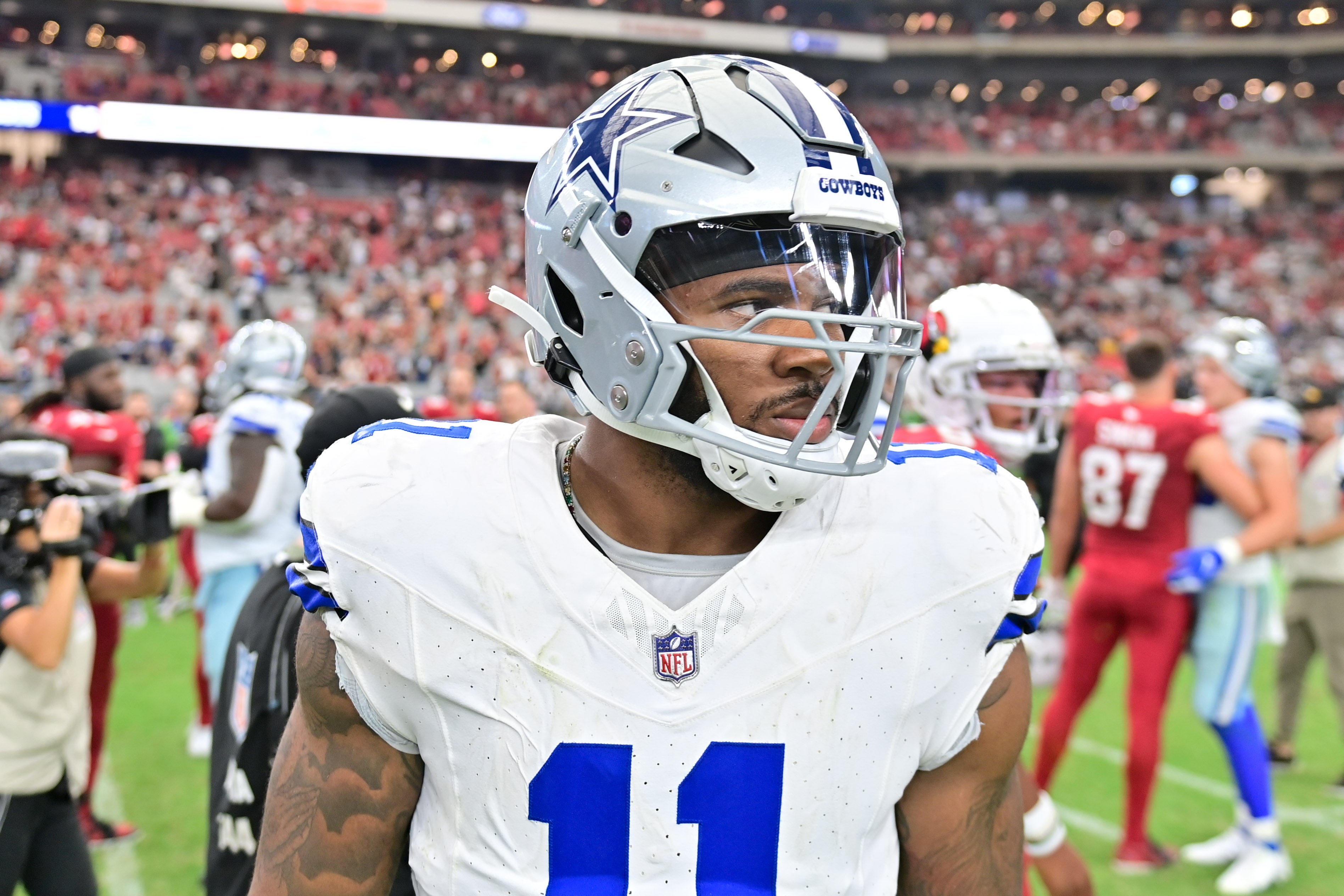 Dallas Cowboys linebacker Micah Parsons (11) looks on after losing to the Arizona Cardinals at State Farm Stadium. Mandatory Credit: Matt Kartozian-USA TODAY Sports