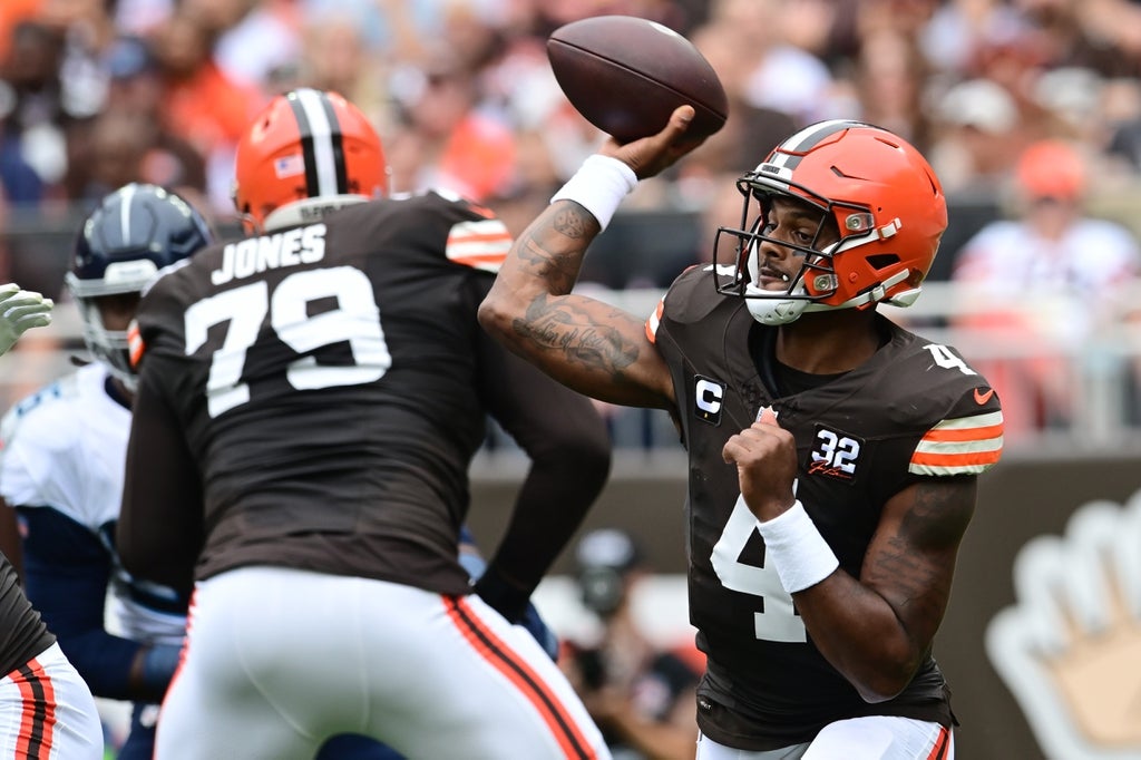 Cleveland Browns quarterback Deshaun Watson (4) throws a pass during the first half against the Tennessee Titans at Cleveland Browns Stadium.