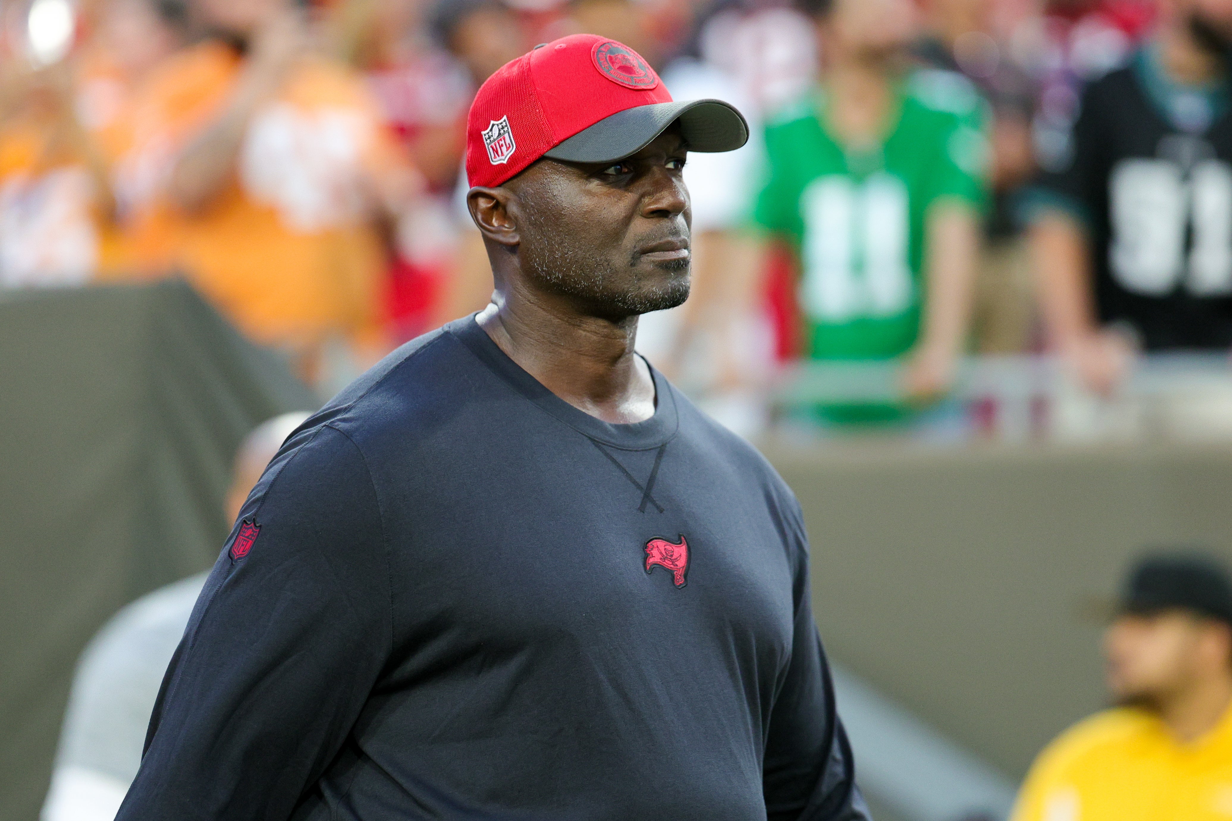 Sep 25, 2023; Tampa, Florida, USA; Tampa Bay Buccaneers head coach Todd Bowles walks onto the field fro warms up before a game against the Philadelphia Eaglesat Raymond James Stadium. Mandatory Credit: Nathan Ray Seebeck-USA TODAY Sports