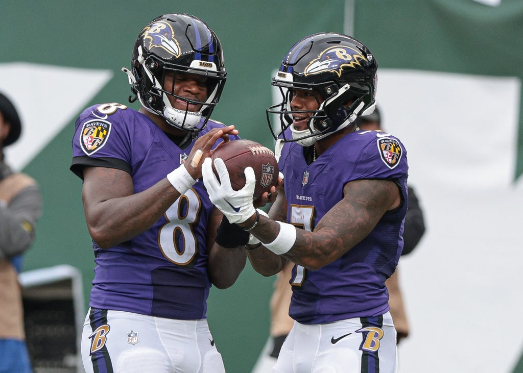 Baltimore Ravens quarterback Lamar Jackson (8) celebrates with wide receiver Rashod Bateman (7) during the second half against the New York Jets at MetLife Stadium.