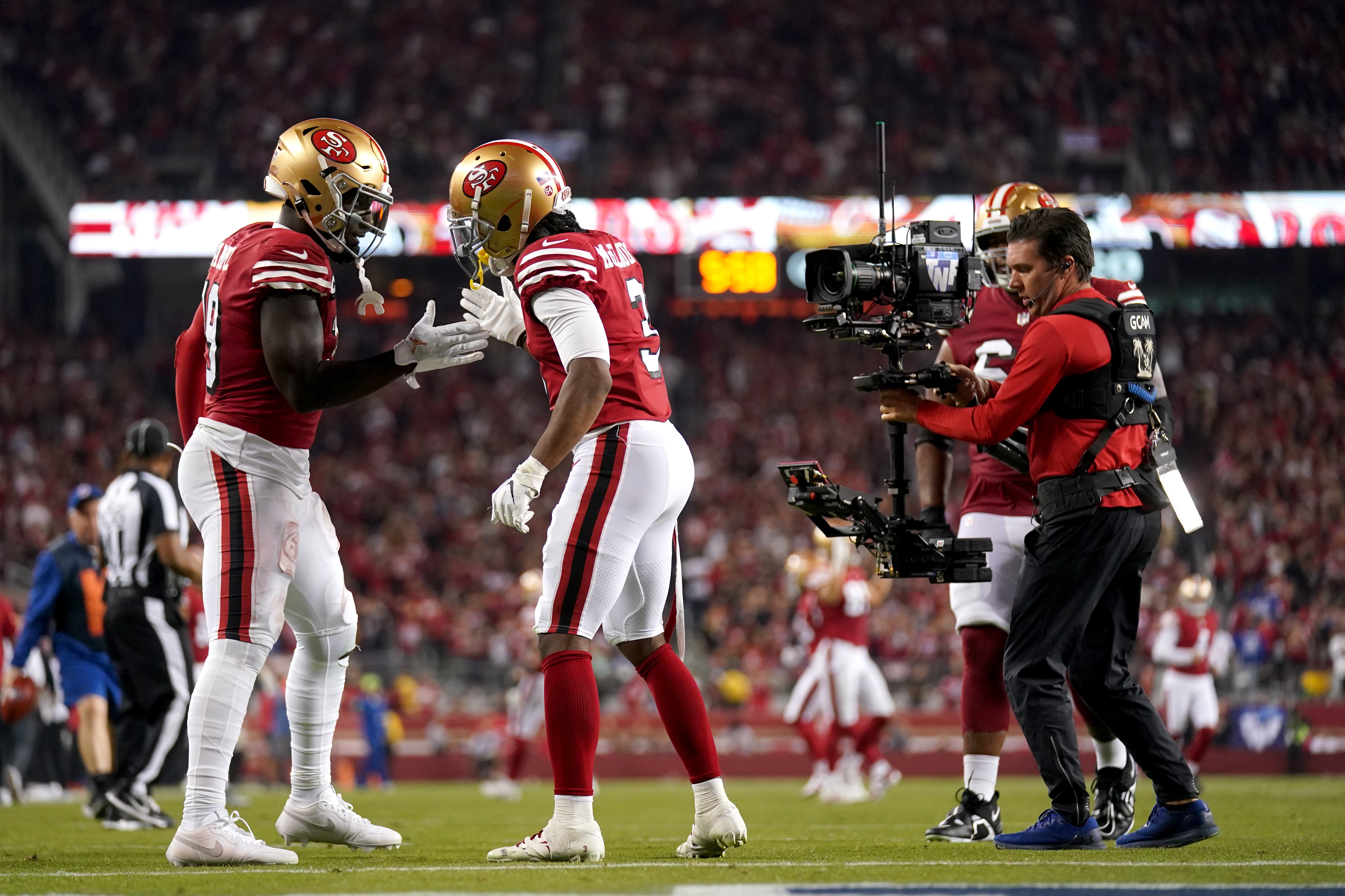 Sep 21, 2023; Santa Clara, California, USA; San Francisco 49ers wide receiver Deebo Samuel (19) celebrates with wide receiver Ray-Ray McCloud III (3) after catching a touchdown pass against the New York Giants in the fourth quarter at Levi's Stadium. Cary Edmondson-USA TODAY Sports