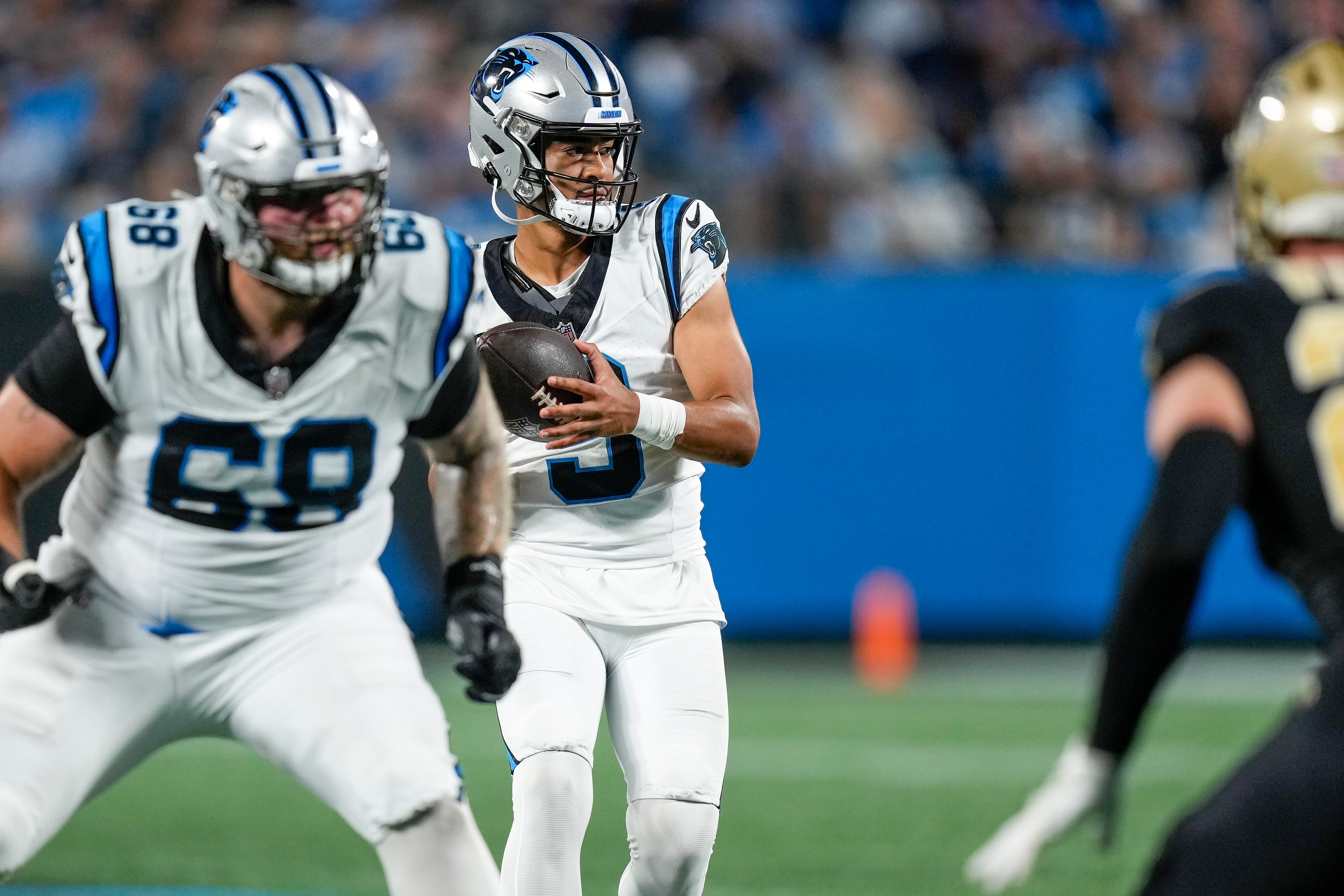 Sep 18, 2023; Charlotte, North Carolina, USA; Carolina Panthers quarterback Bryce Young (9) looks for a receiver against the New Orleans Saints during the second quarter at Bank of America Stadium. Mandatory Credit: Jim Dedmon-USA TODAY Sports
