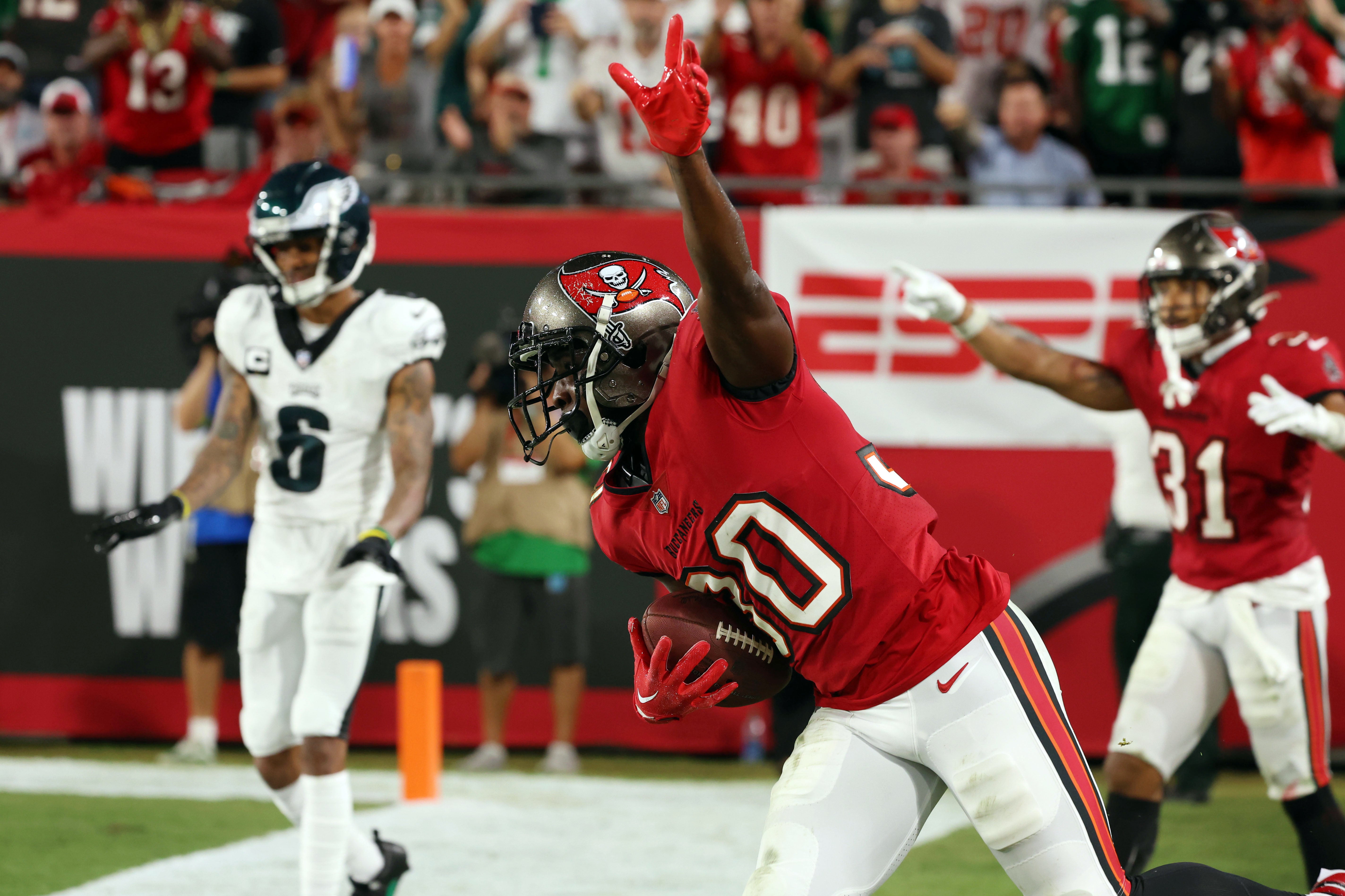 Sep 25, 2023; Tampa, Florida, USA; Tampa Bay Buccaneers cornerback Dee Delaney (30) celebrates after he intercepted the ball against the Philadelphia Eagles during the second half at Raymond James Stadium. Mandatory Credit: Kim Klement Neitzel-USA TODAY Sports
