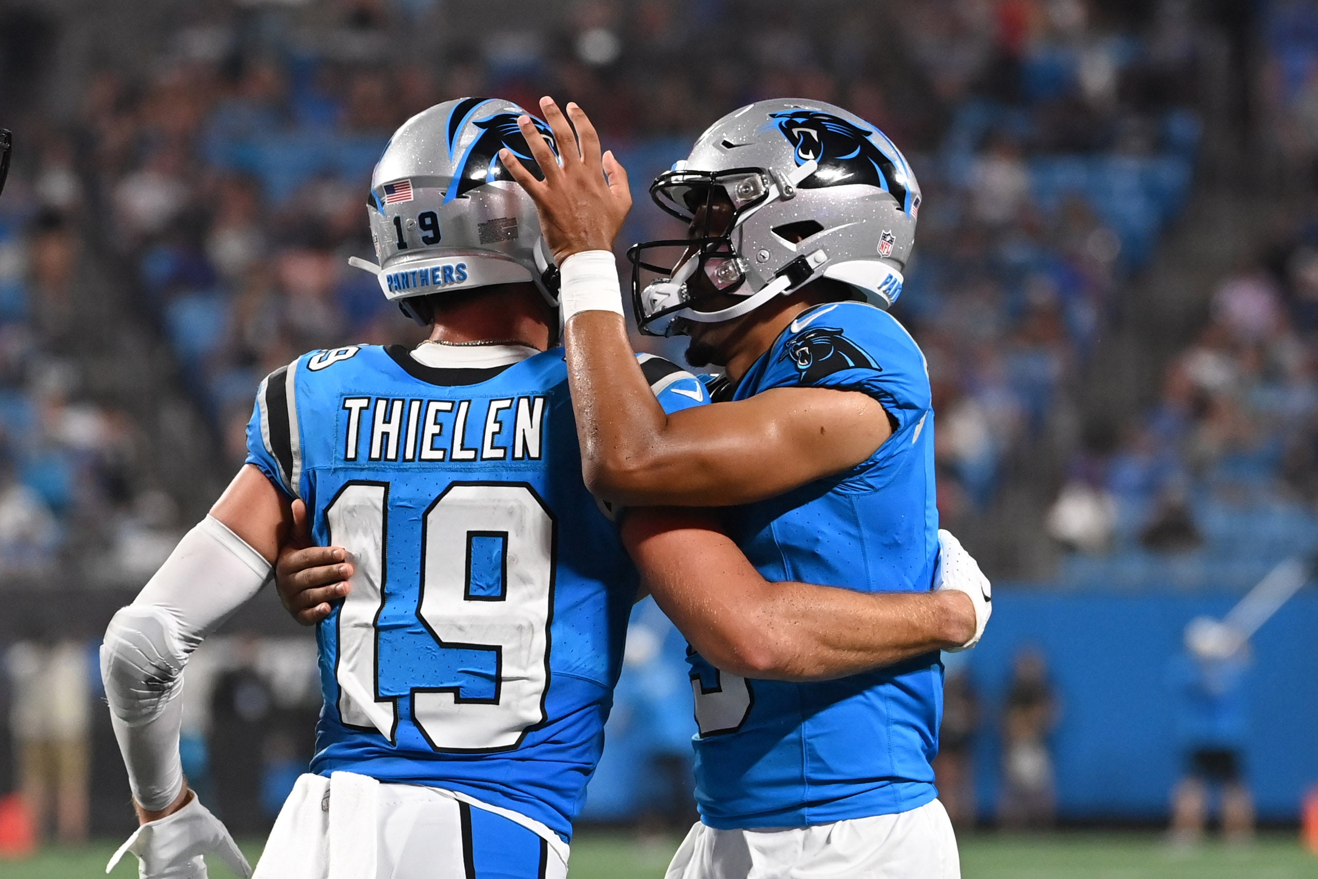 Aug 25, 2023; Charlotte, North Carolina, USA; Carolina Panthers wide receiver Adam Thielen (19) celebrates with quarterback Bryce Young (9) after scoring a touchdown in the first quarter at Bank of America Stadium. Mandatory Credit: Bob Donnan-USA TODAY Sports