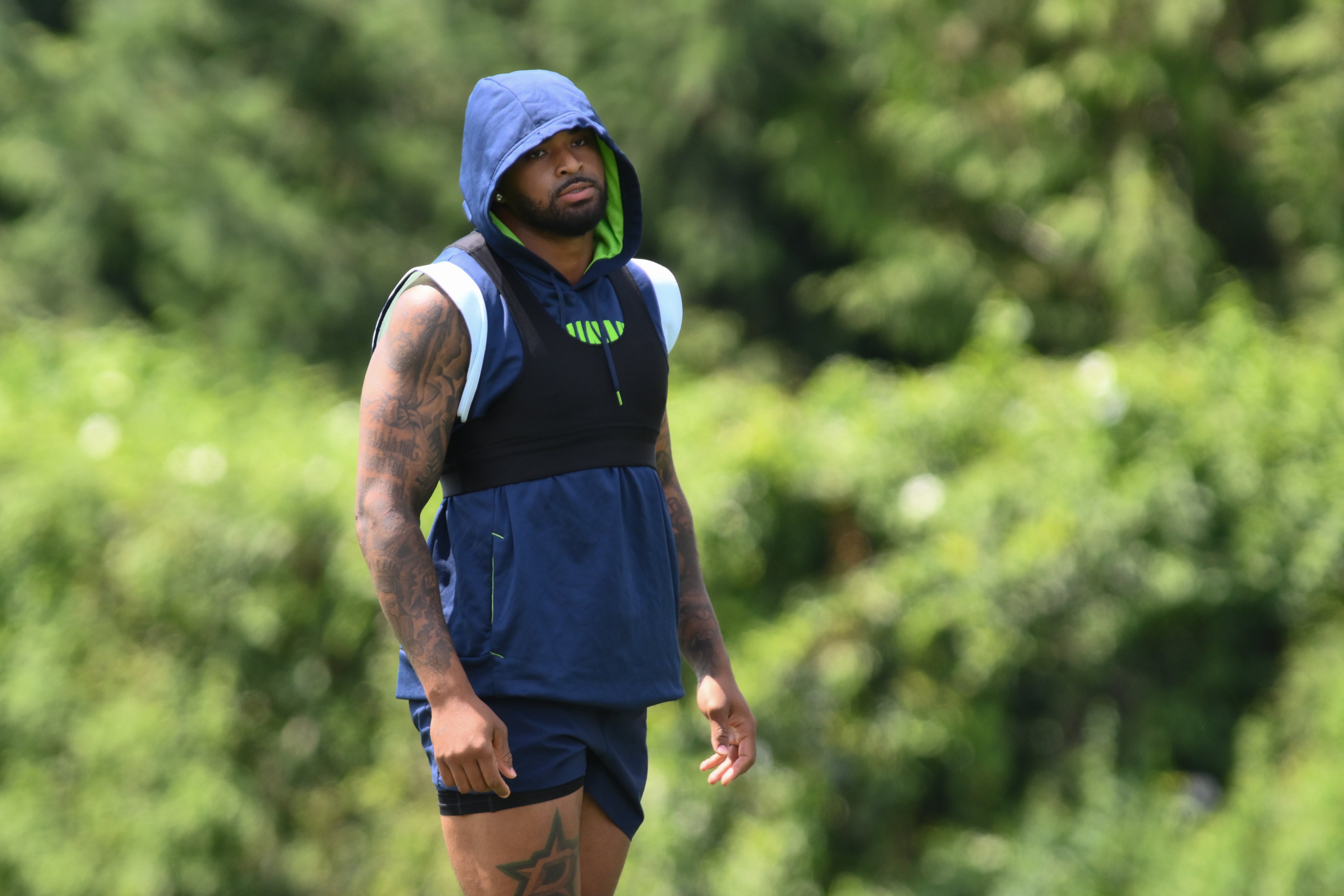 Jul 30, 2023; Renton, WA, USA; Seattle Seahawks safety Jamal Adams (33) warms up prior to training camp at Virginia Mason Athletic Center. Mandatory Credit: Steven Bisig-USA TODAY Sports