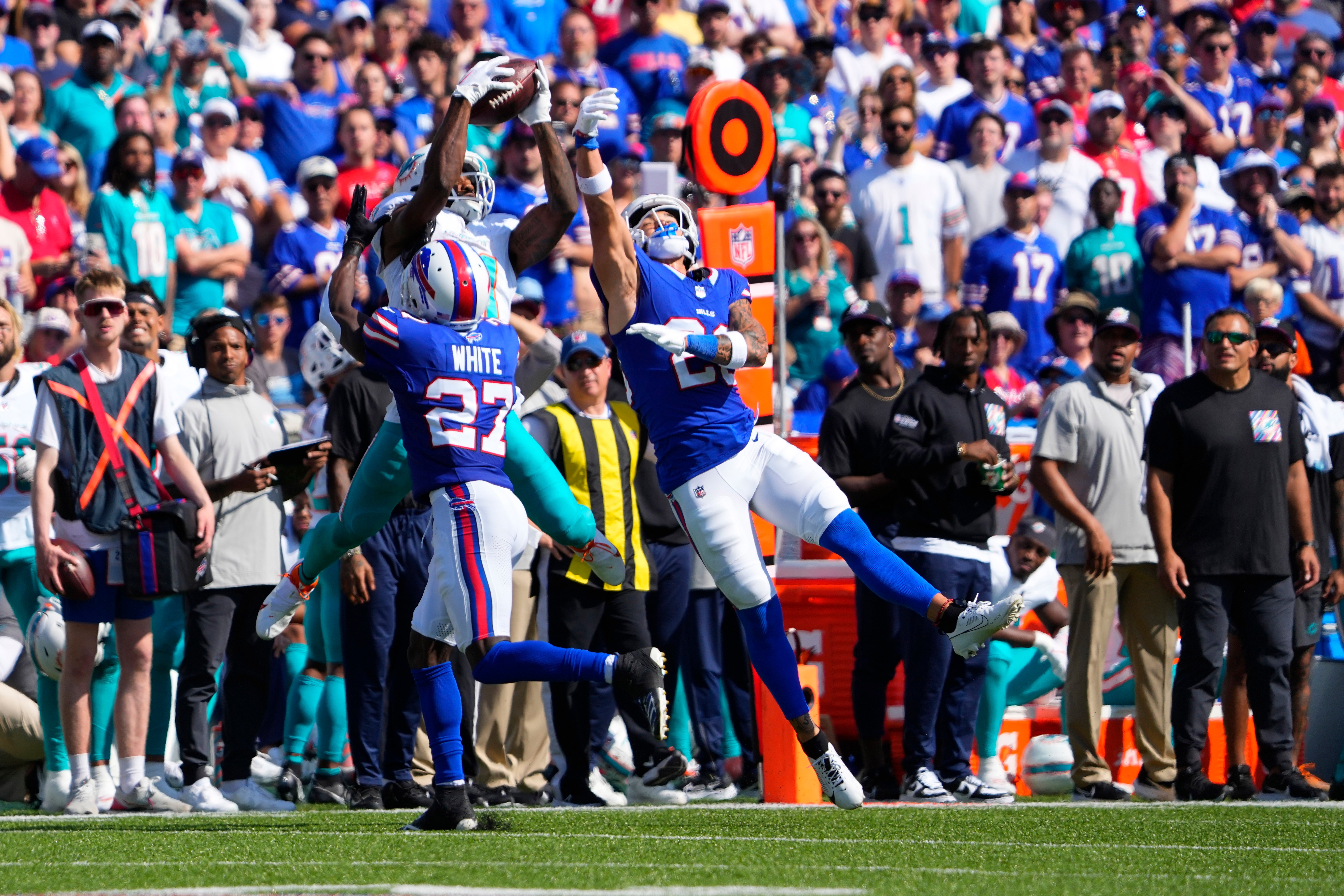 Buffalo Bills All-Pro CB Tre'Davious White attempting to disrupt a pass in a contest against the Miami Dolphins