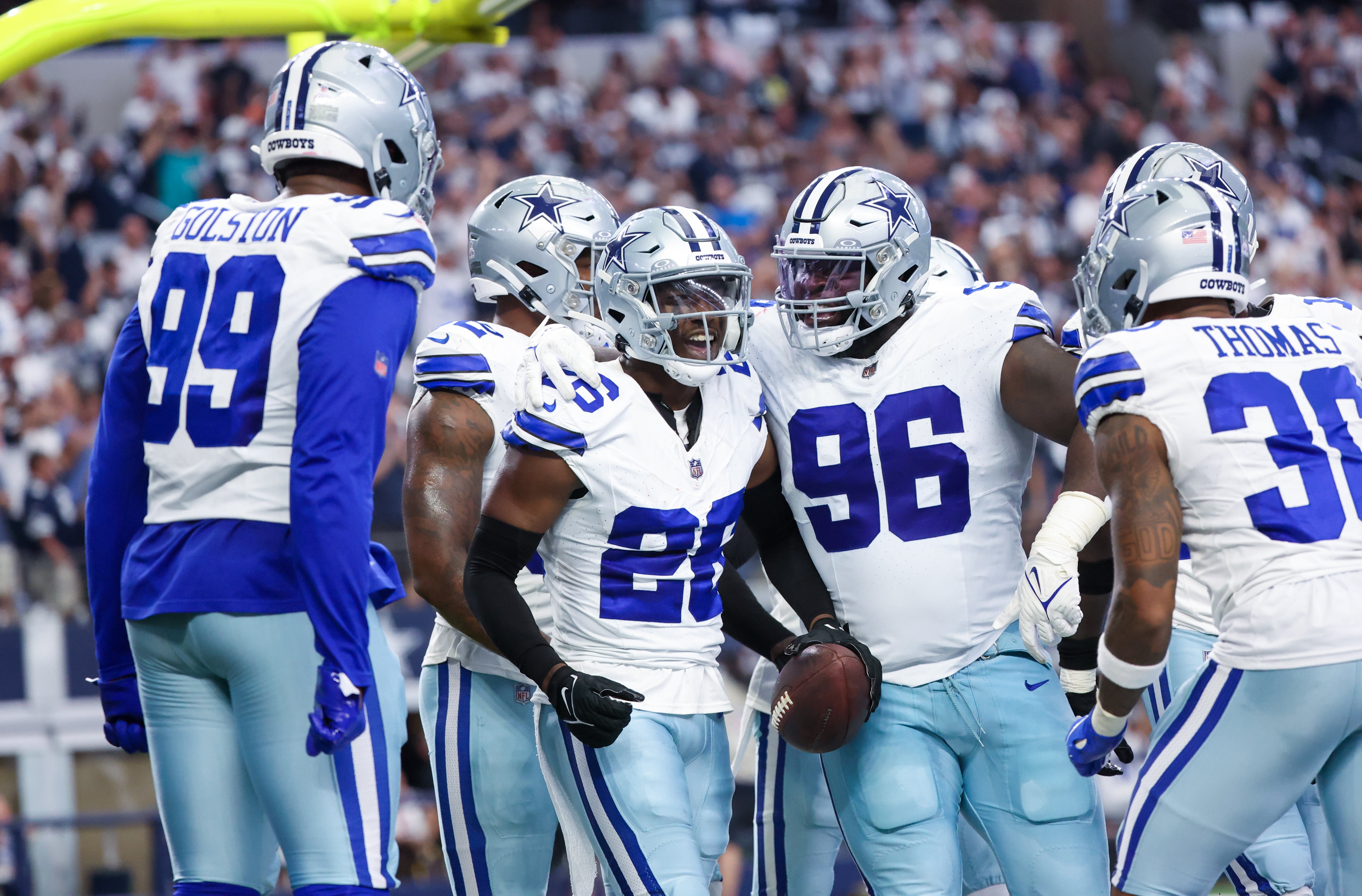 Dallas Cowboys cornerback DaRon Bland (26) celebrates with teammates after returning an interception for a touchdown during the first half against the New England Patriots at AT&T Stadium. Mandatory Credit: Kevin Jairaj-USA TODAY Sports