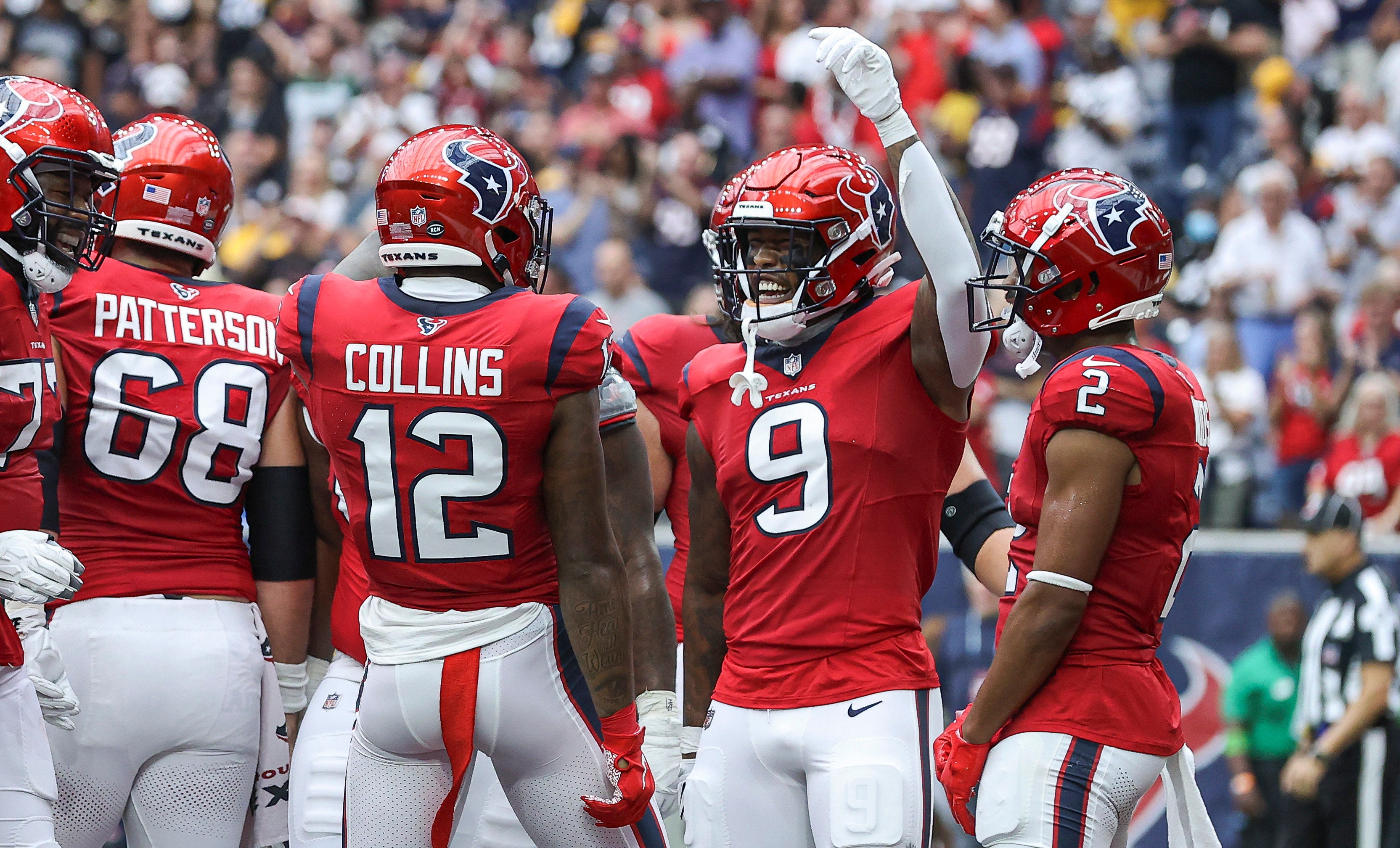 Oct 1, 2023; Houston, Texas, USA; Houston Texans wide receiver Nico Collins (12) celebrates with tight end Brevin Jordan (9) after scoring a touchdown during the first quarter against the Pittsburgh Steelers at NRG Stadium.