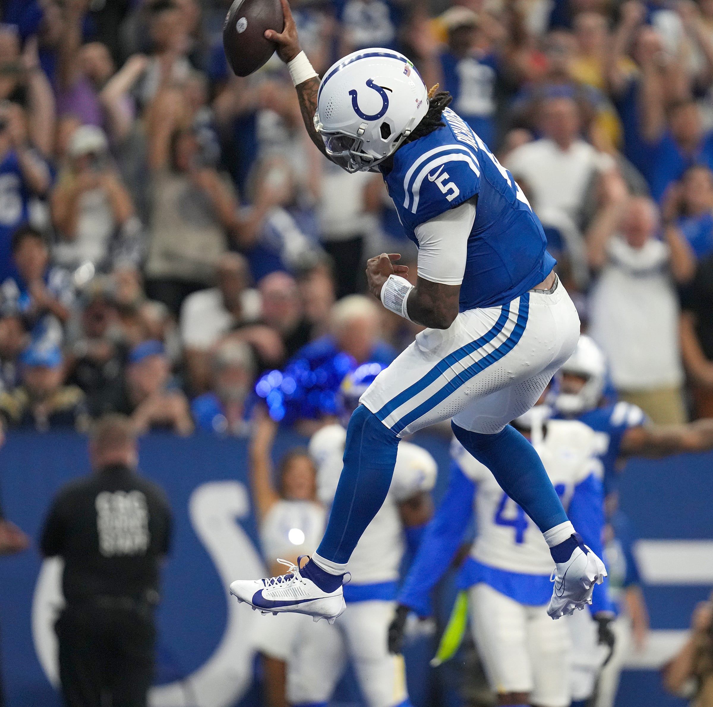 Indianapolis Colts quarterback Anthony Richardson (5) celebrates a touchdown during the second half of the game against the Los Angeles Rams on Sunday, Oct. 1, 2023, at Lucas Oil Stadium in Indianapolis. The Colts lost in overtime, 29-23.