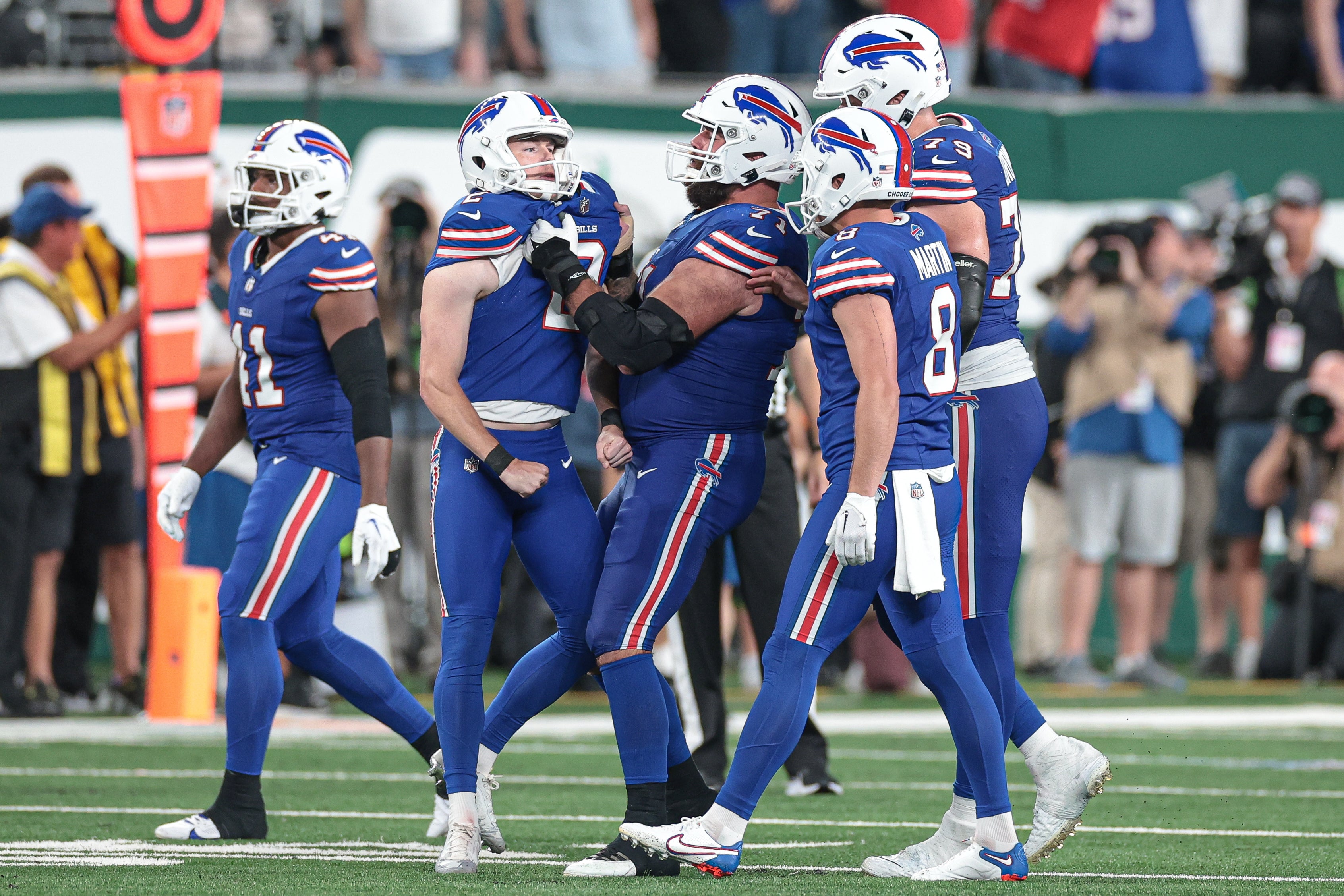 Buffalo Bills K Tyler Bass celebrating with his teammates during NFL Week 1 against the New York Jets
