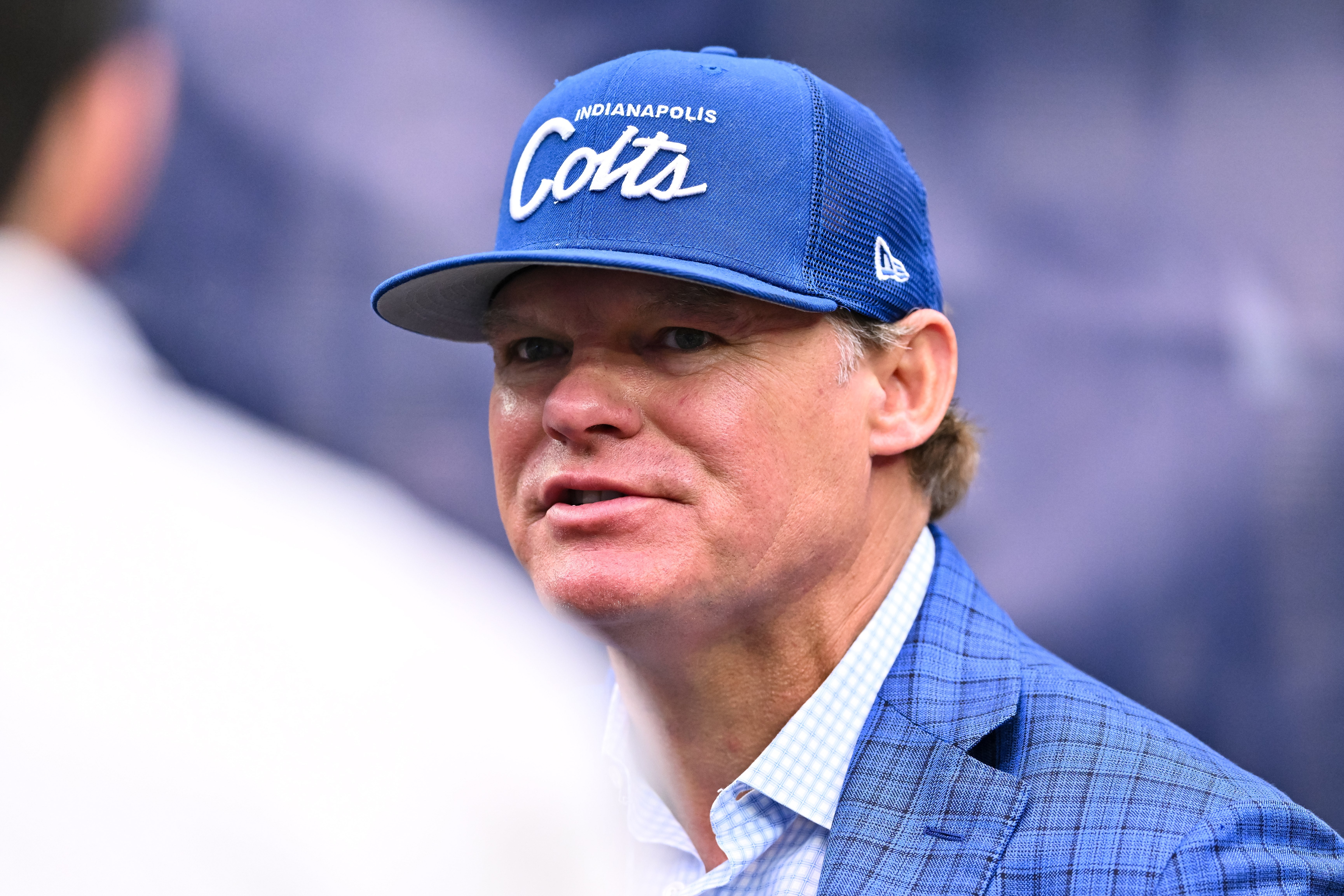 Sep 17, 2023; Houston, Texas, USA; Indianapolis Colts general manager Chris Ballard speaks with fans on the sideline prior to the game against the Houston Texans at NRG Stadium.