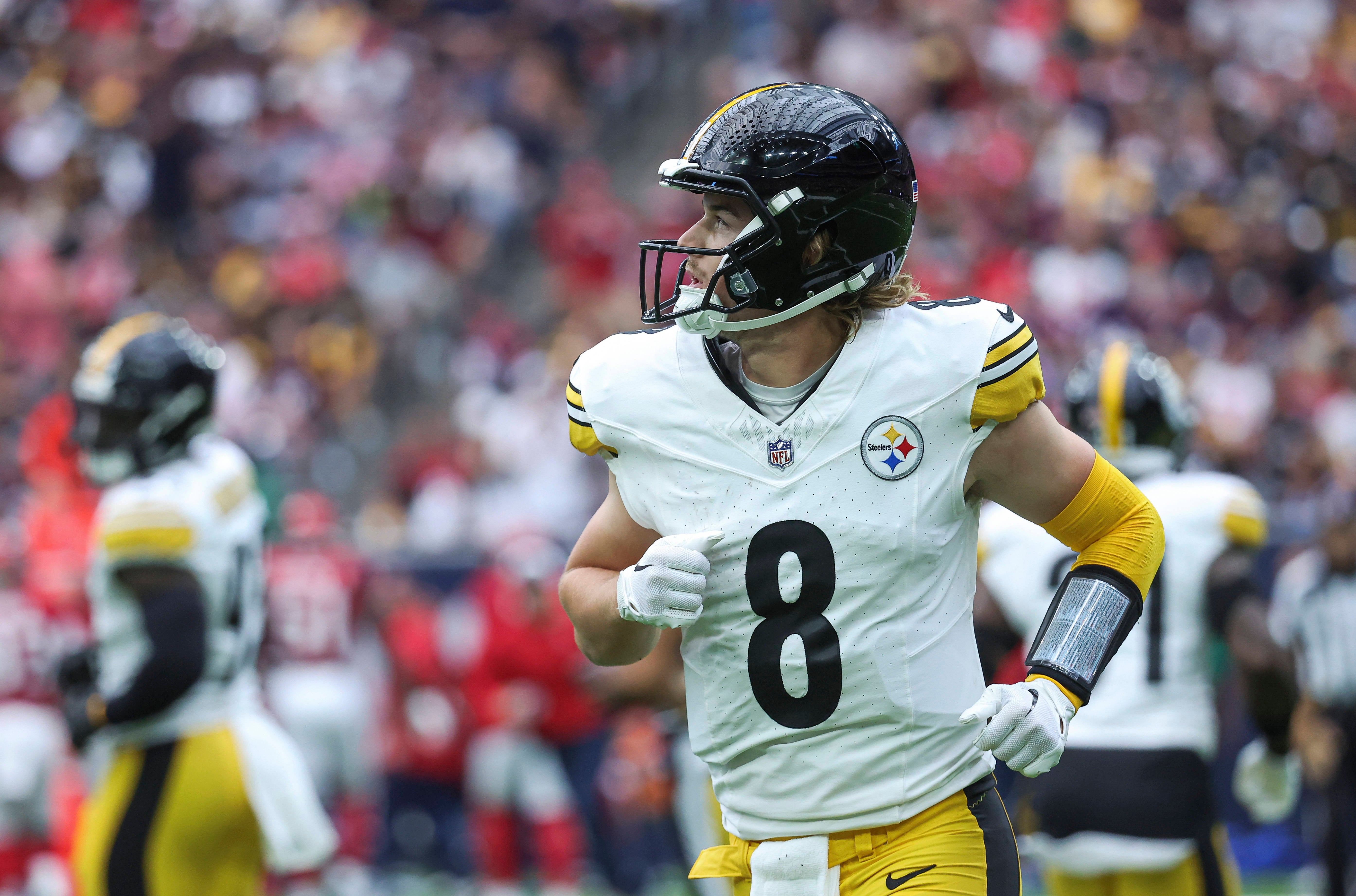Oct 1, 2023; Houston, Texas, USA; Pittsburgh Steelers quarterback Kenny Pickett (8) jogs off the field after a play during the first quarter against the Houston Texans at NRG Stadium. Mandatory Credit: Troy Taormina-USA TODAY Sports