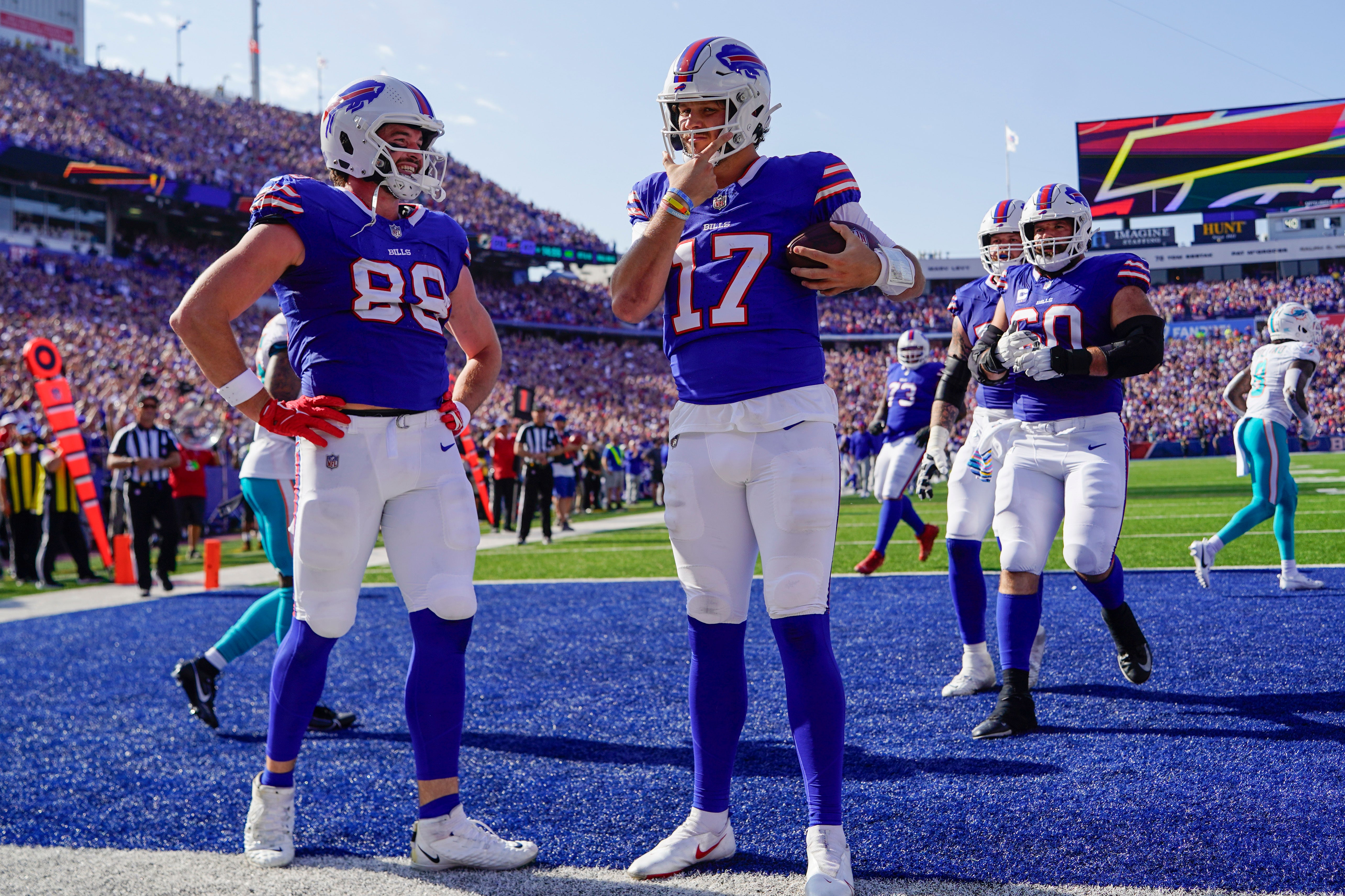 Buffalo Bills QB Josh Allen celebrating in the endzone against the Miami Dolphins