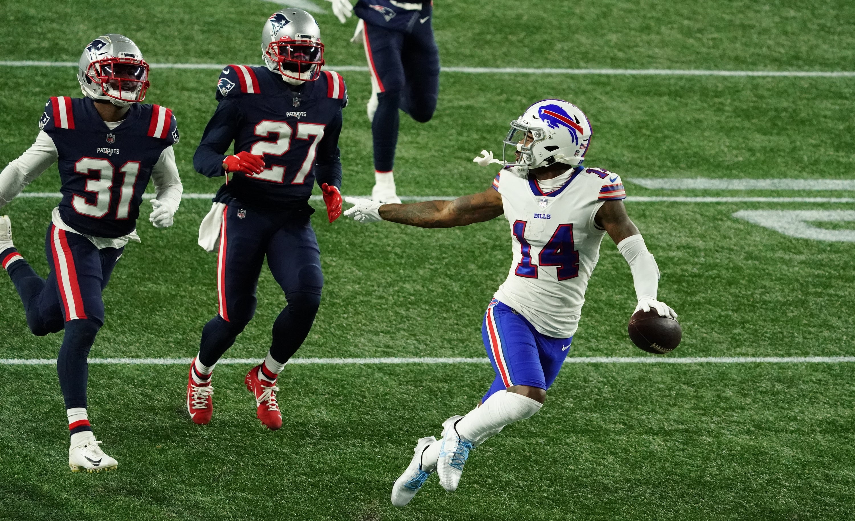 Buffalo Bills WR Stefon Diggs scoring a TD against New England Patriots CB J.C. Jackson