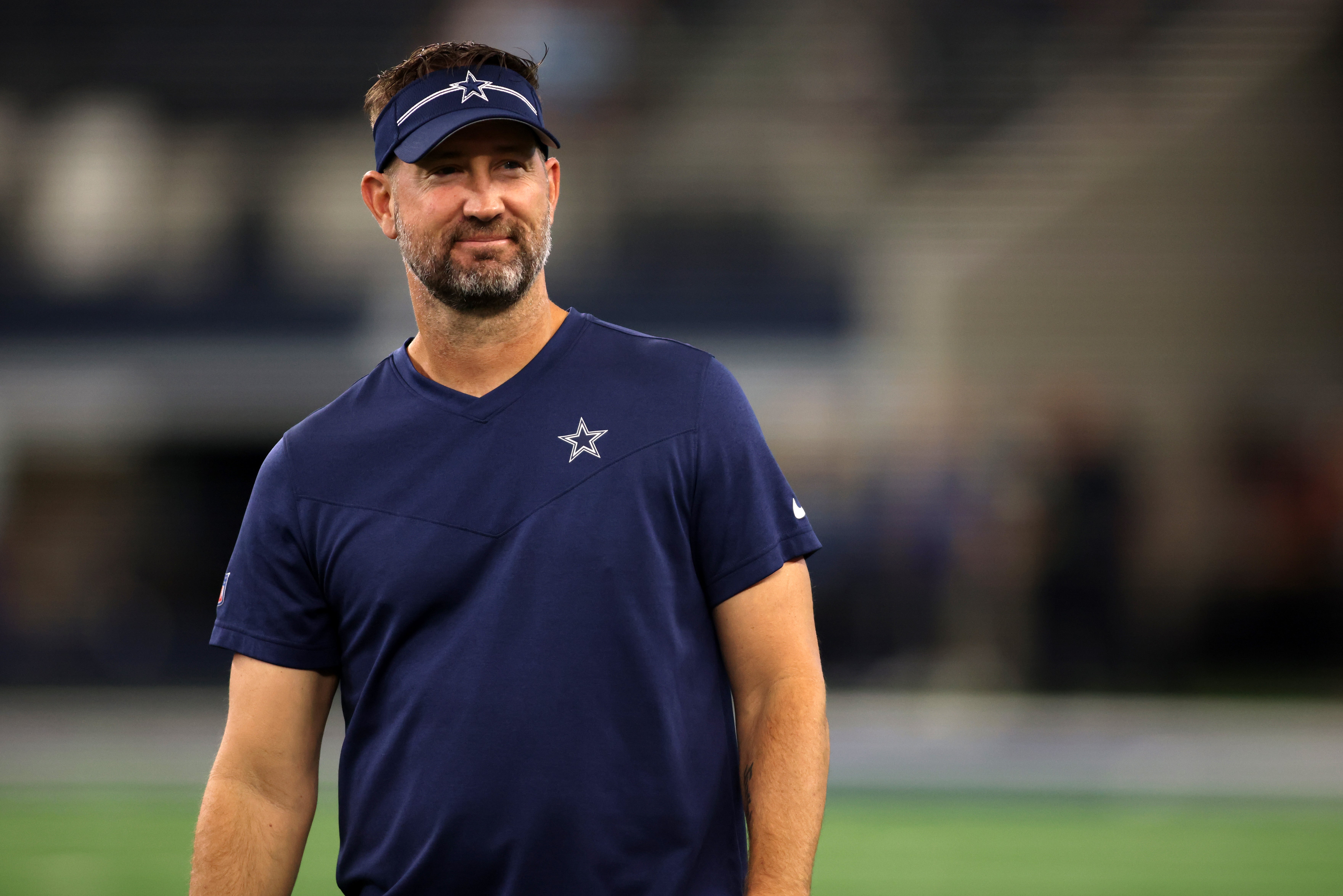 Dallas Cowboys offensive coordinator Brian Schottenheimer on the field before the game against the Las Vegas Raiders at AT&T Stadium. Mandatory Credit: Tim Heitman-USA TODAY Sports