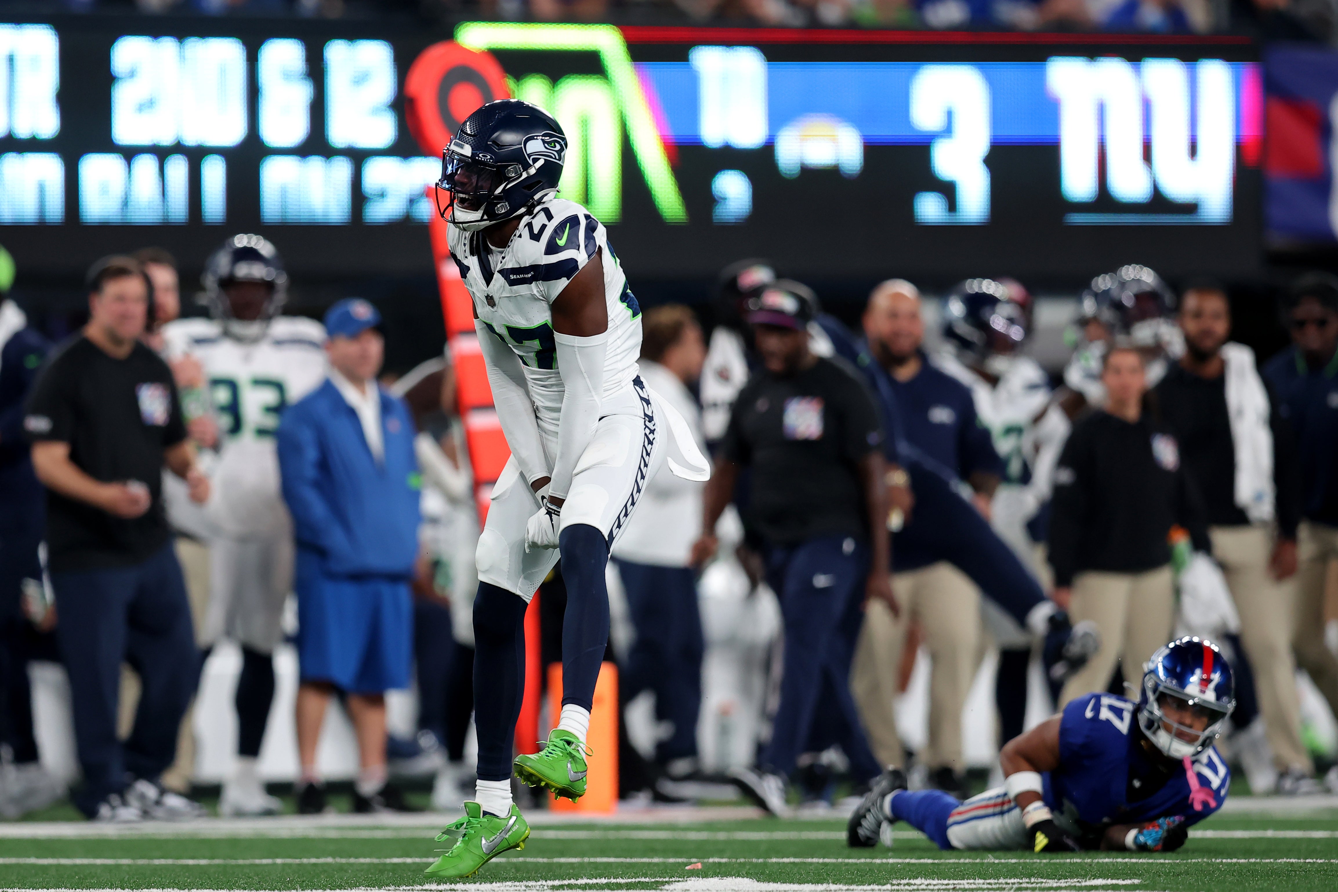 Oct 2, 2023; East Rutherford, New Jersey, USA; Seattle Seahawks cornerback Riq Woolen (27) reacts after breaking up a pass intended for New York Giants wide receiver Wan'Dale Robinson (17) during the second quarter at MetLife Stadium. Mandatory Credit: Brad Penner-USA TODAY Sports