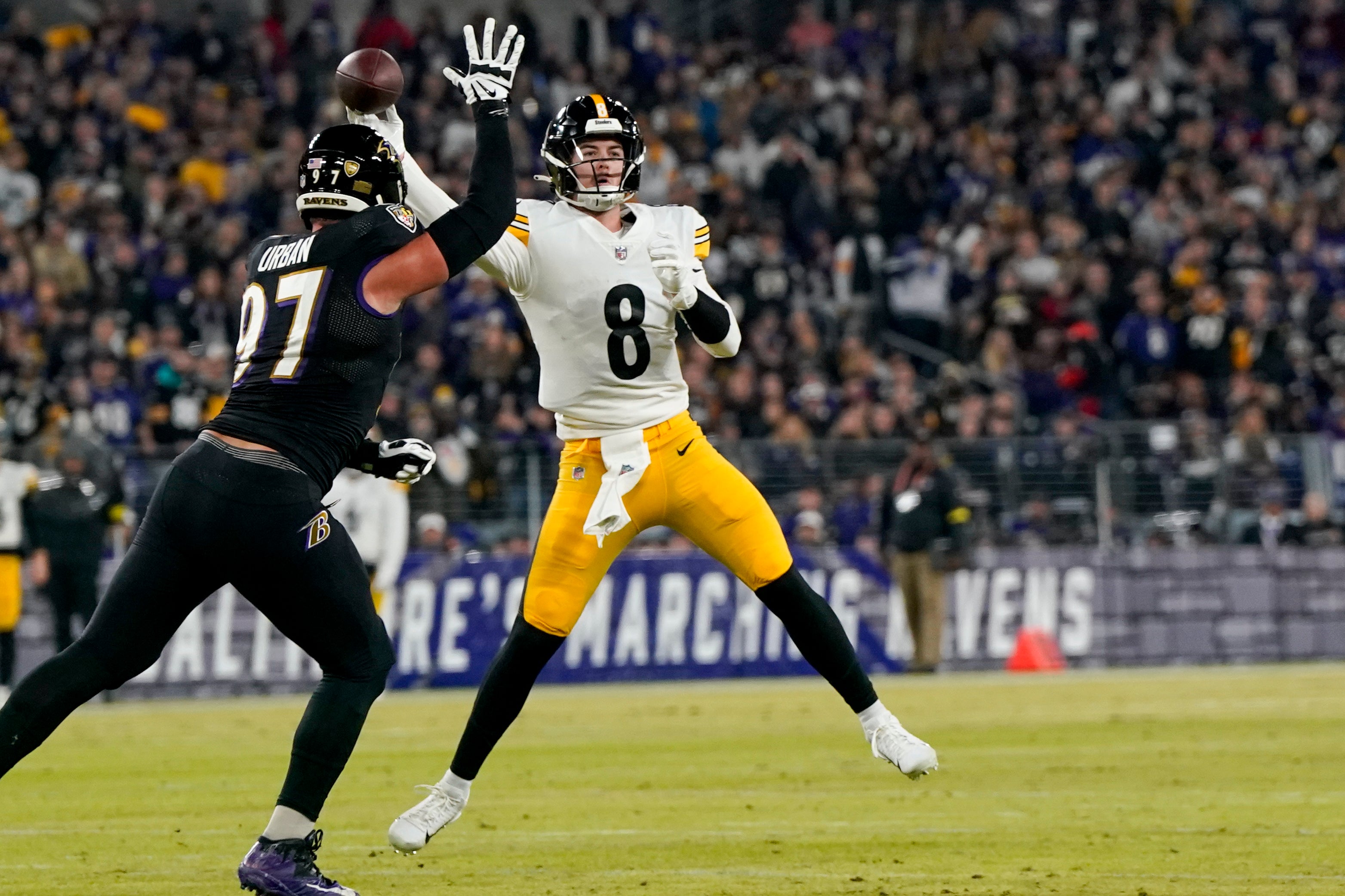 Jan 1, 2023; Baltimore, Maryland, USA; Pittsburgh Steelers quarterback Kenny Pickett (8) throws against Baltimore Ravens defensive end Brent Urban (97) during the first half at M&T Bank Stadium. Mandatory Credit: Jessica Rapfogel-USA TODAY Sports
