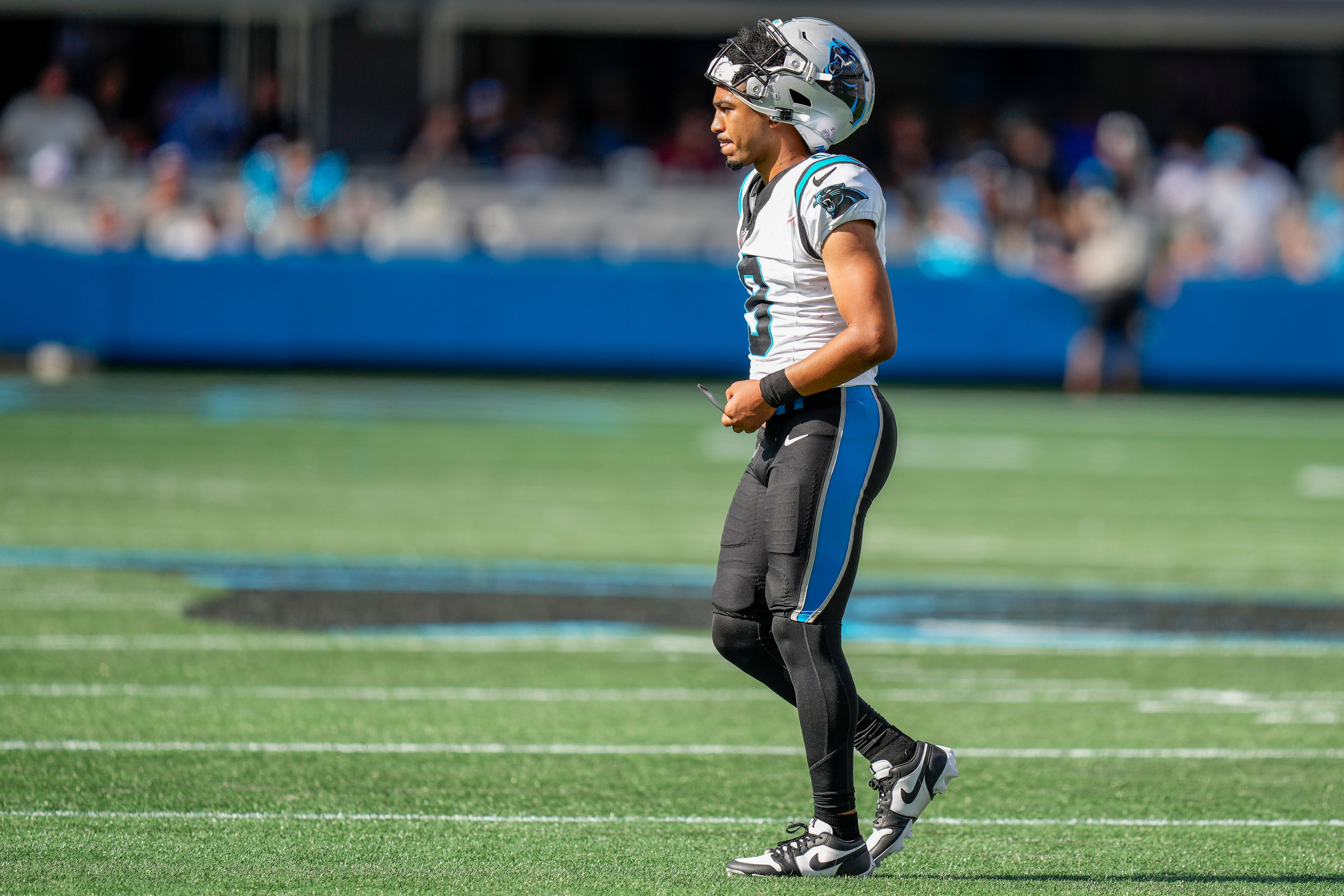 Oct 1, 2023; Charlotte, North Carolina, USA; Carolina Panthers quarterback Bryce Young (9) walks off the field after third down during the second half against the Minnesota Vikings at Bank of America Stadium. Mandatory Credit: Jim Dedmon-USA TODAY Sports