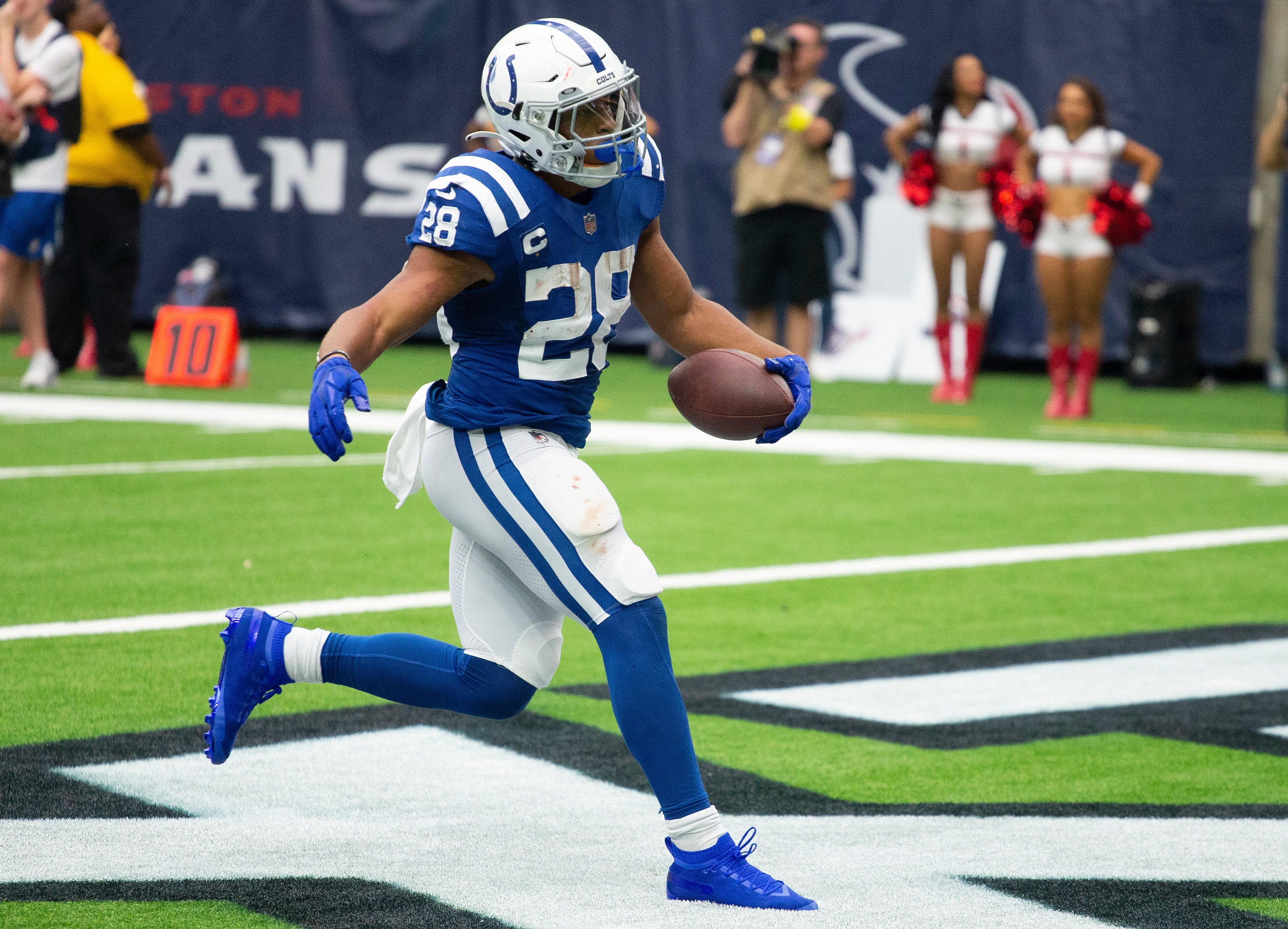 Sep 11, 2022; Houston, Texas, USA; Indianapolis Colts running back Jonathan Taylor (28) rushes for a touchdown against the Houston Texans in the fourth quarter at NRG Stadium.
