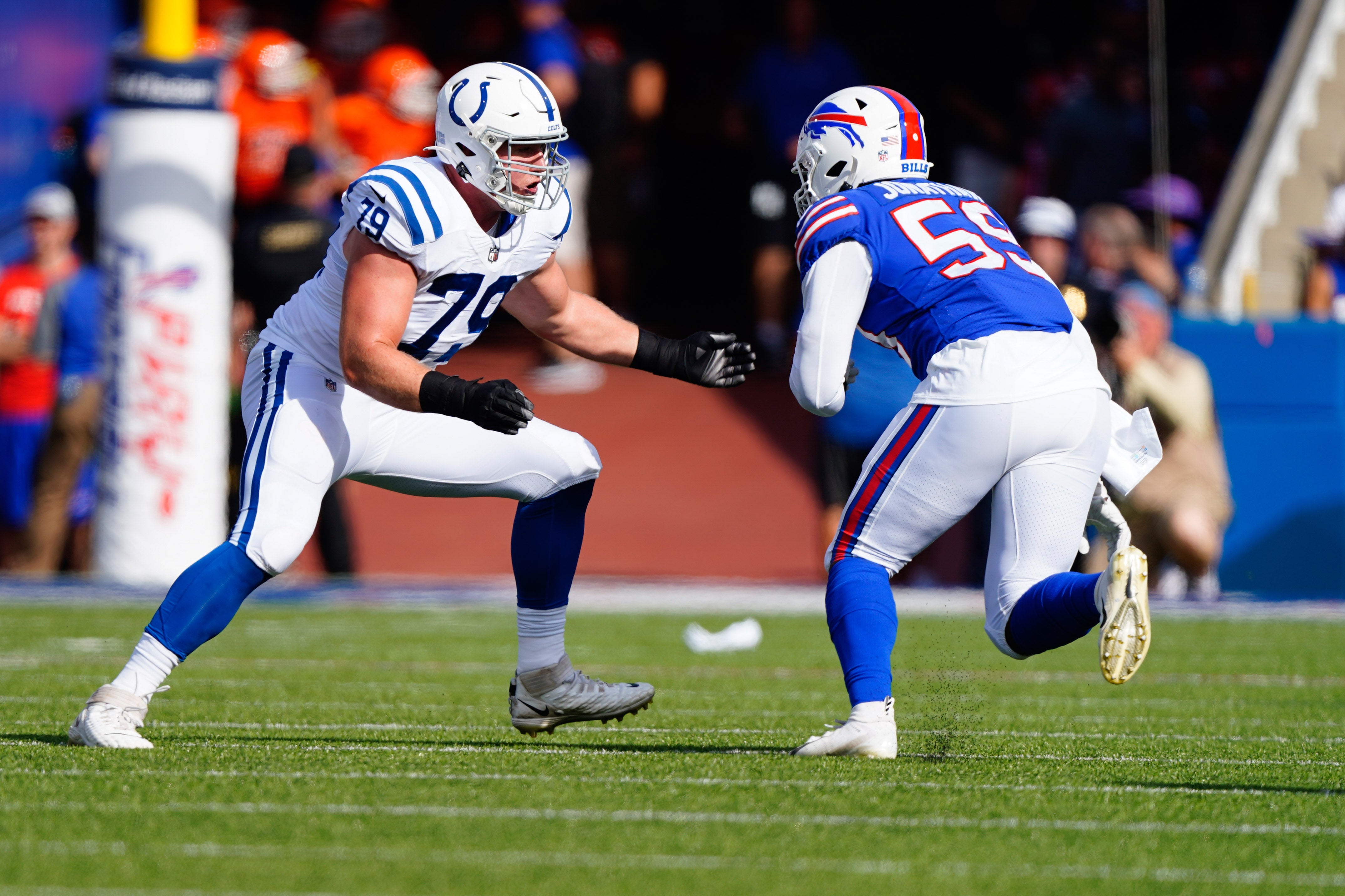 Aug 13, 2022; Orchard Park, New York, USA; Indianapolis Colts offensive tackle Bernhard Raimann blocks Buffalo Bills defensive end Kingsley Jonathan (59) during the first half at Highmark Stadium.