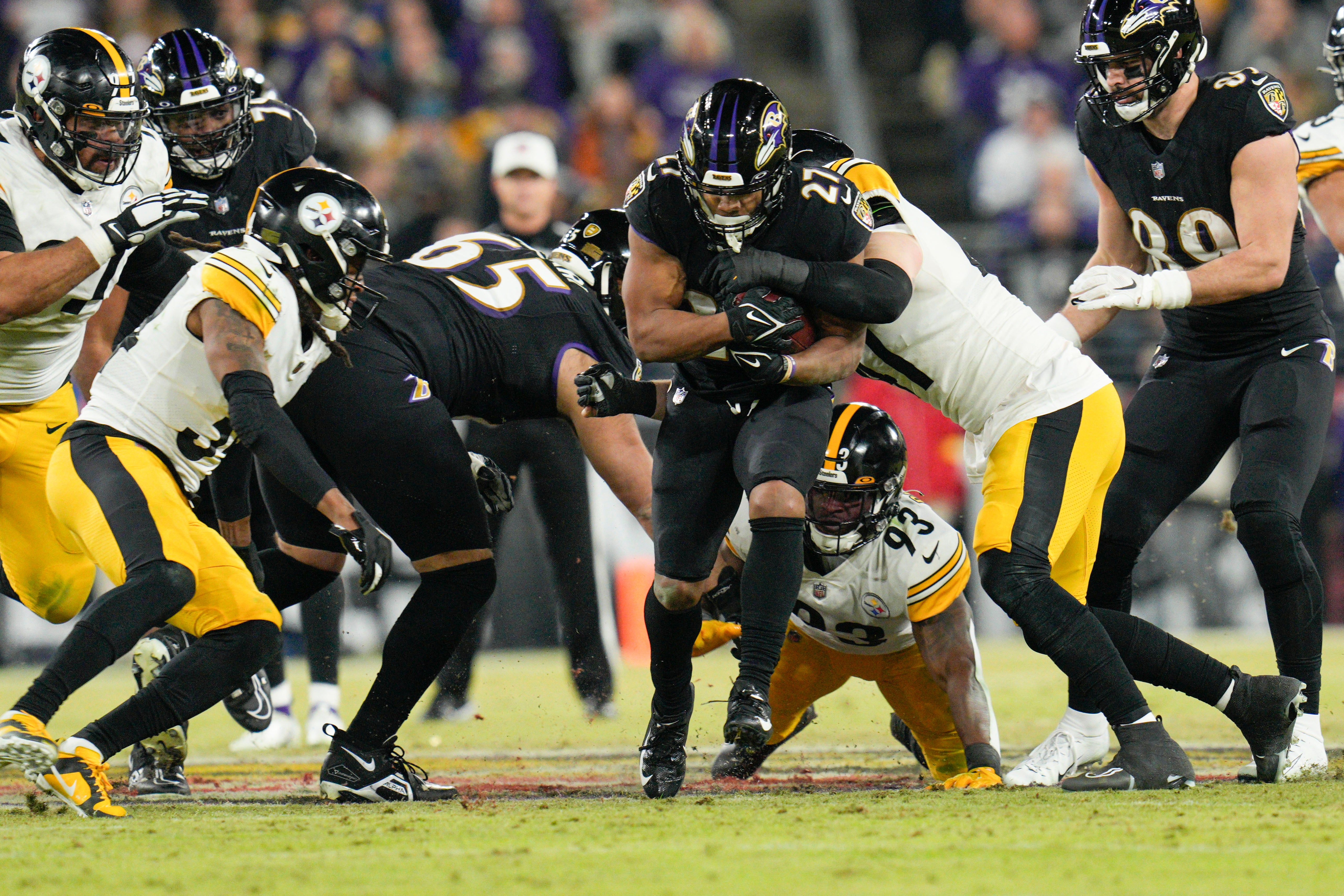 Jan 1, 2023; Baltimore, Maryland, USA; Baltimore Ravens running back J.K. Dobbins (27) runs with the ball against the Pittsburgh Steelers during the first half at M&T Bank Stadium. Mandatory Credit: Jessica Rapfogel-USA TODAY Sports  