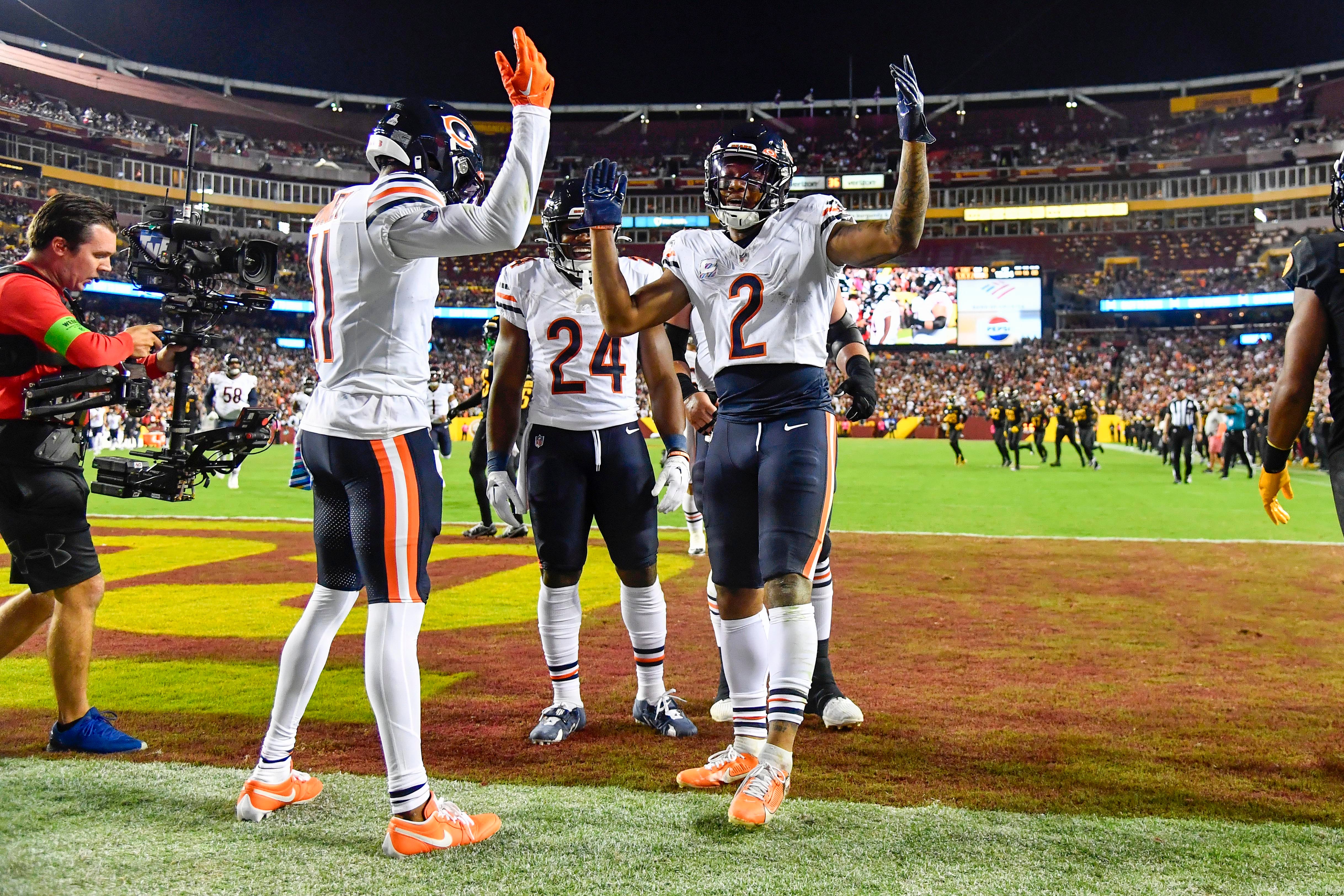 Oct 5, 2023; Landover, Maryland, USA; Chicago Bears wide receiver DJ Moore (2) celebrates after scoring a touchdown against the Washington Commanders during the first half at FedExField.