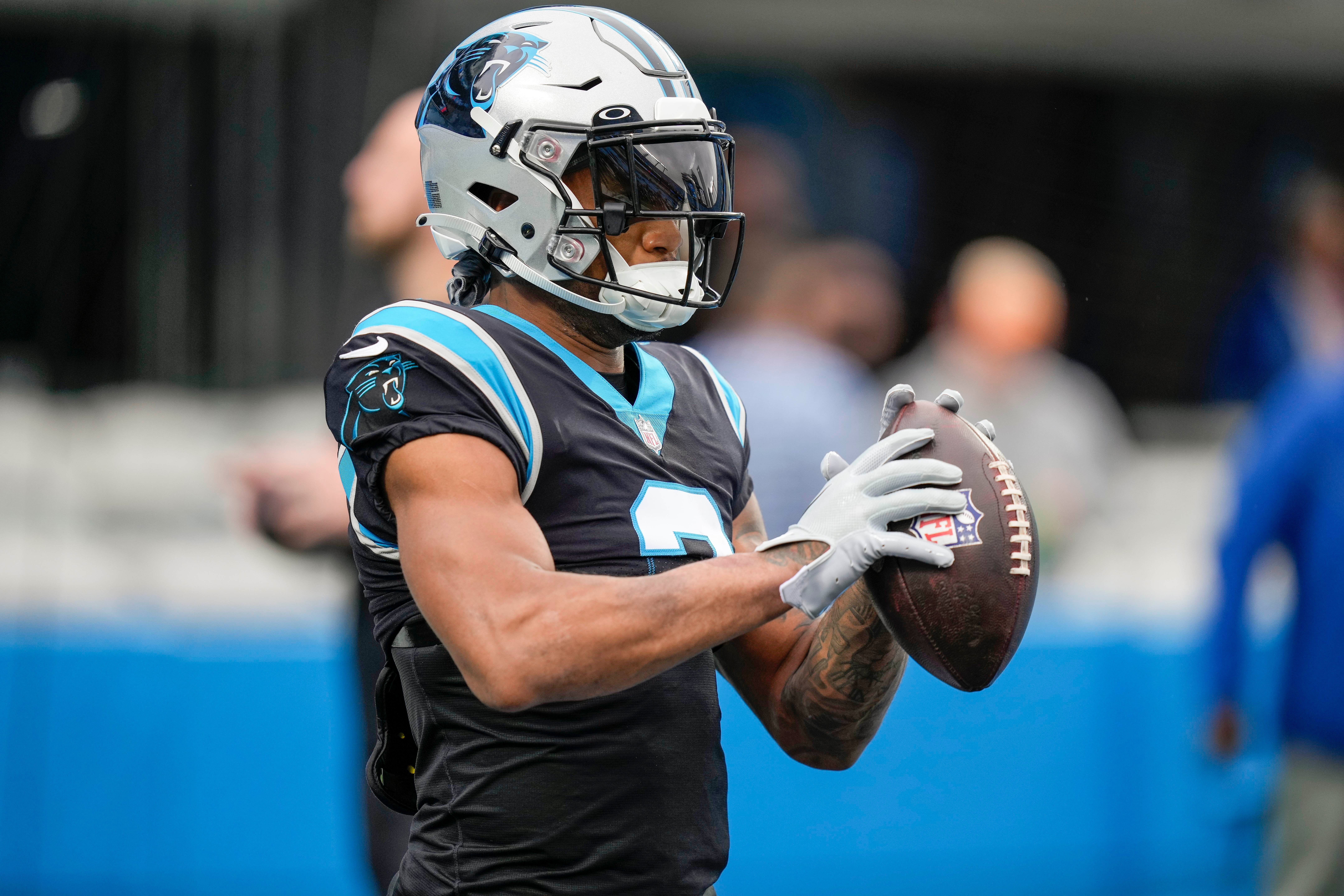 Nov 27, 2022; Charlotte, North Carolina, USA; Carolina Panthers wide receiver DJ Moore (2) makes a catch during pregame warmups against the Denver Broncos at Bank of America Stadium. Mandatory Credit: Jim Dedmon-USA TODAY Sports.