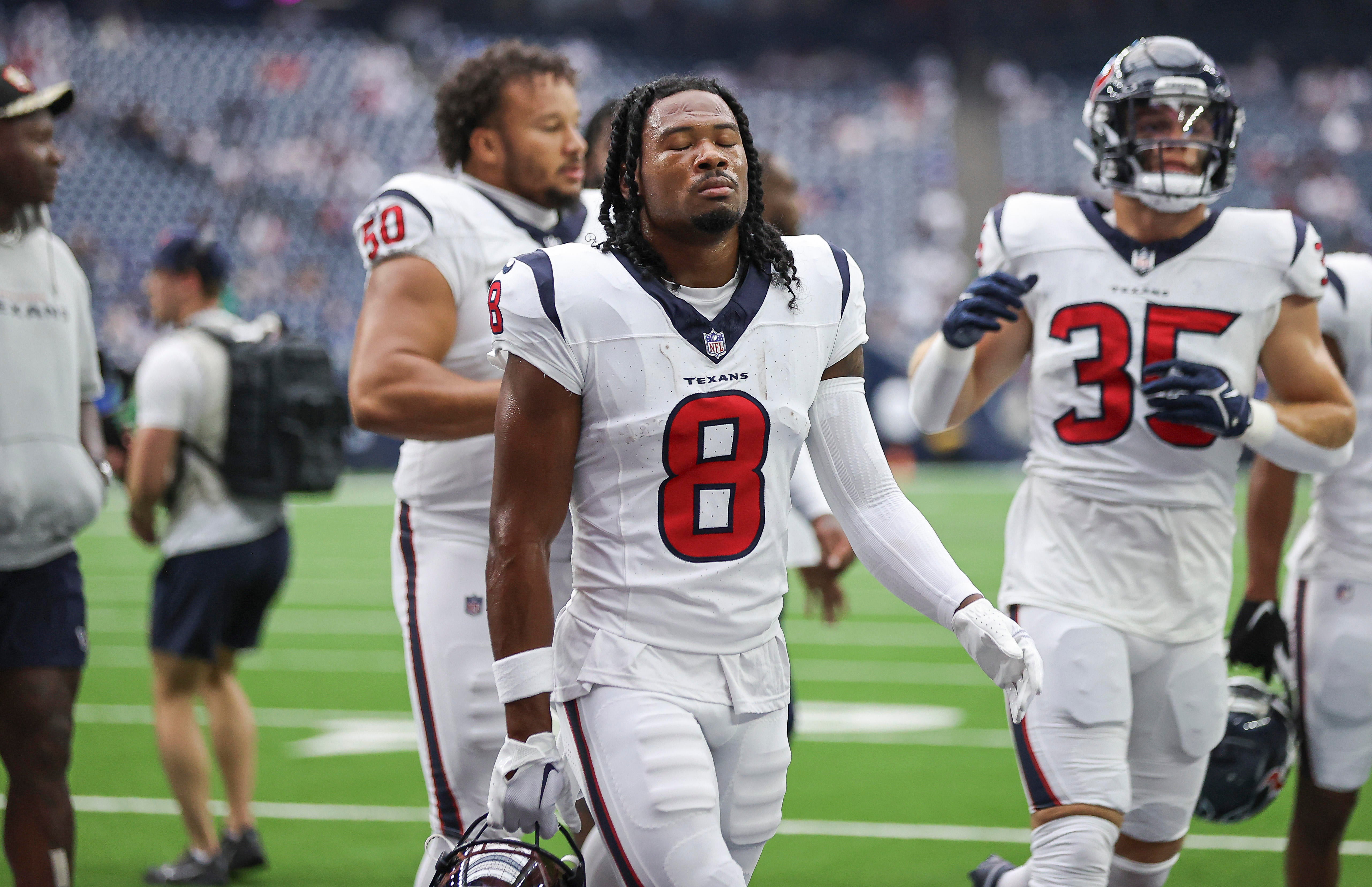 Sep 17, 2023; Houston, Texas, USA; Houston Texans wide receiver John Metchie III (8) walks off the field before the game against the Indianapolis Colts at NRG Stadium.