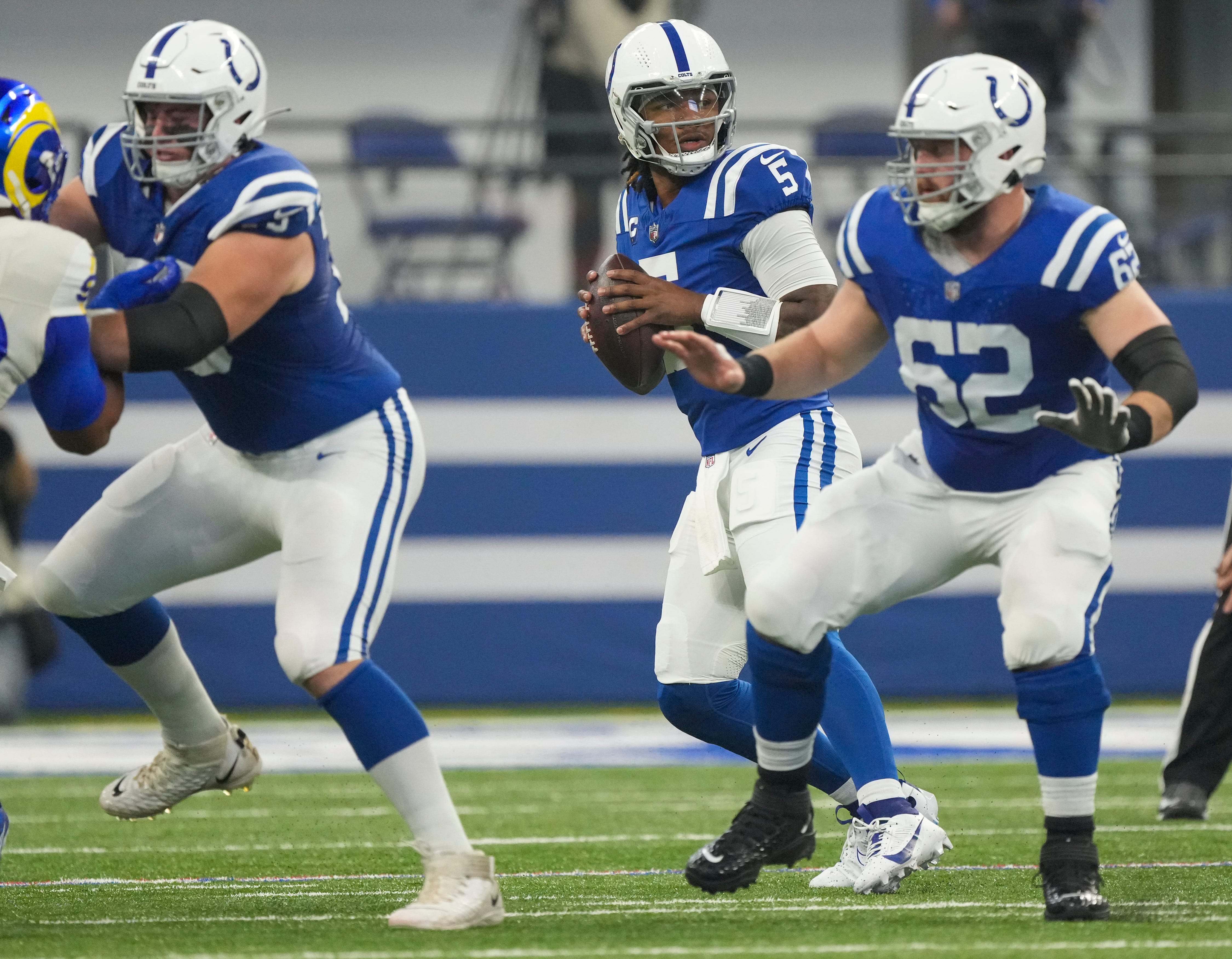 Indianapolis Colts quarterback Anthony Richardson (5) drops back to pass during game action against the Los Angeles Rams at Indianapolis Colts, on Sunday, Oct. 1, 2023, at Lucas Oil Stadium in Indianapolis.