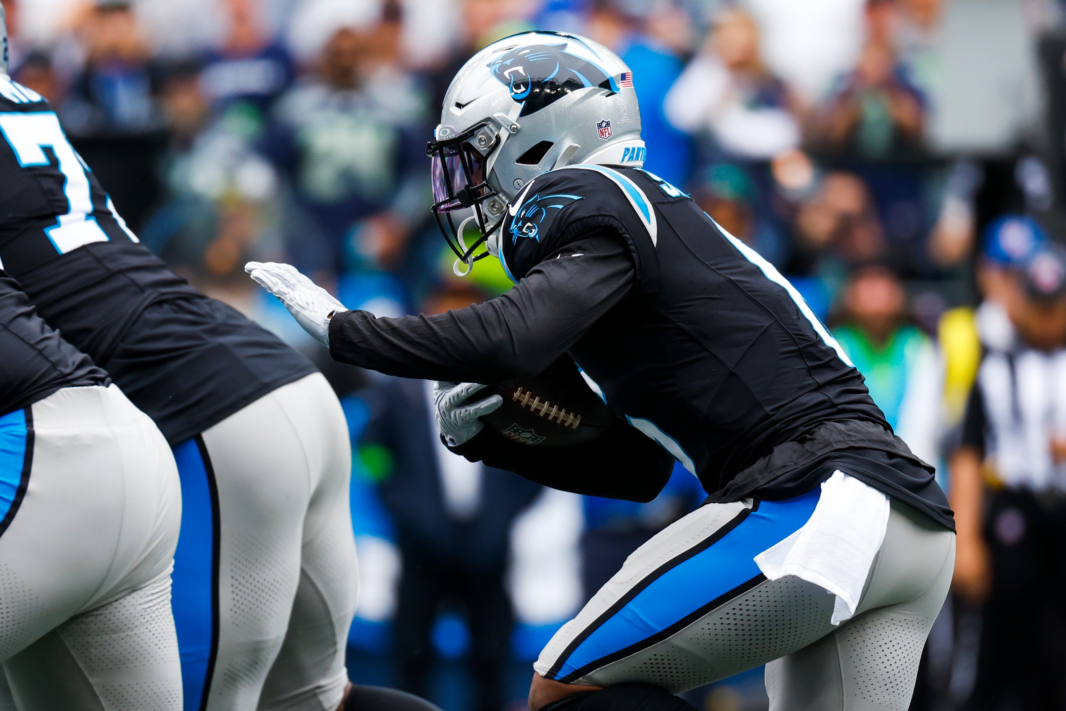 Sep 24, 2023; Seattle, Washington, USA; Carolina Panthers running back Miles Sanders (6) rushes against the Seattle Seahawks during the first quarter at Lumen Field. Mandatory Credit: Joe Nicholson-USA TODAY Sports