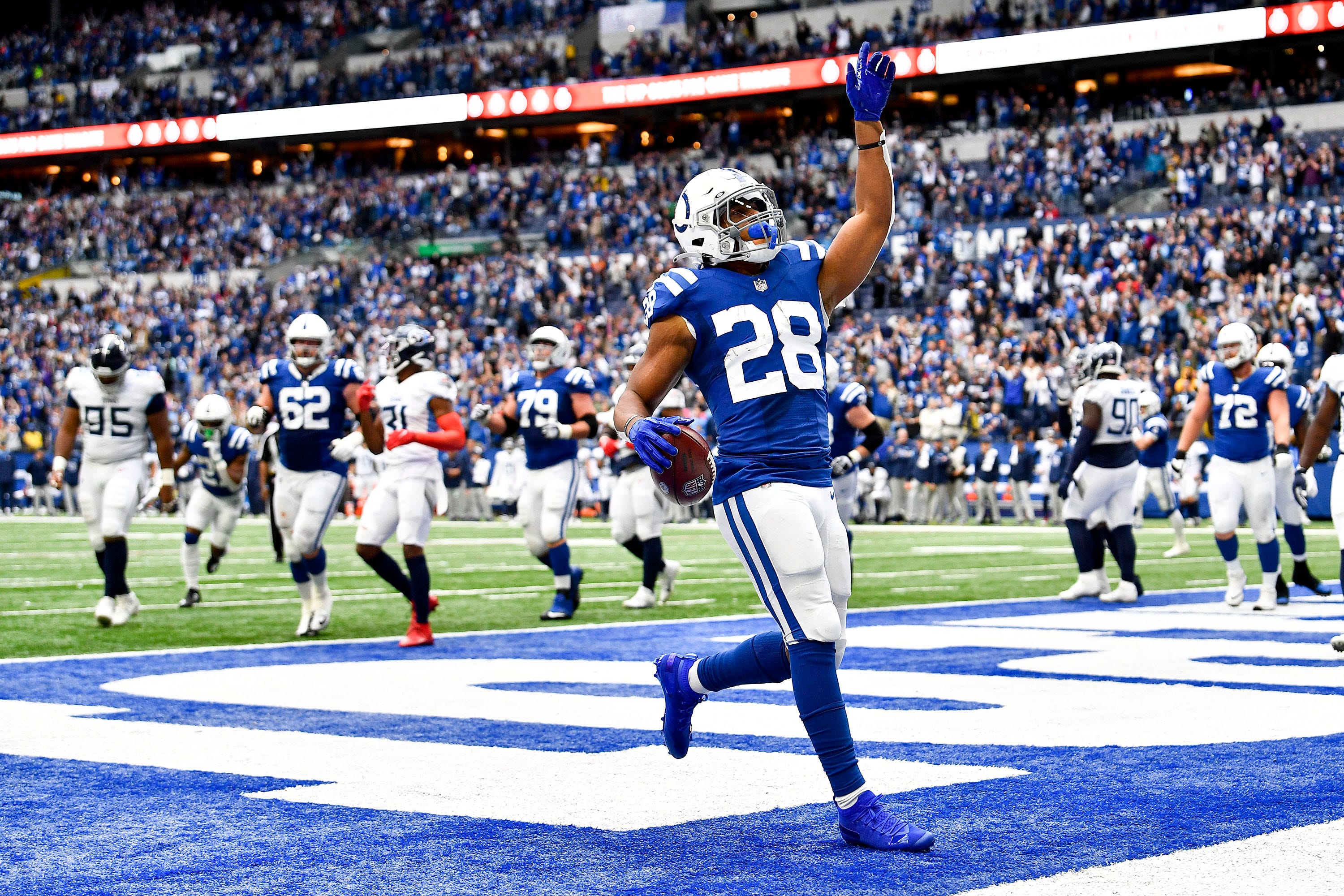 Indianapolis Colts running back Jonathan Taylor (28) scores a touchdown late in the fourth quarter at Lucas Oil Stadium Sunday, Oct. 31, 2021 in Indianapolis, Ind. Titans Colts 127