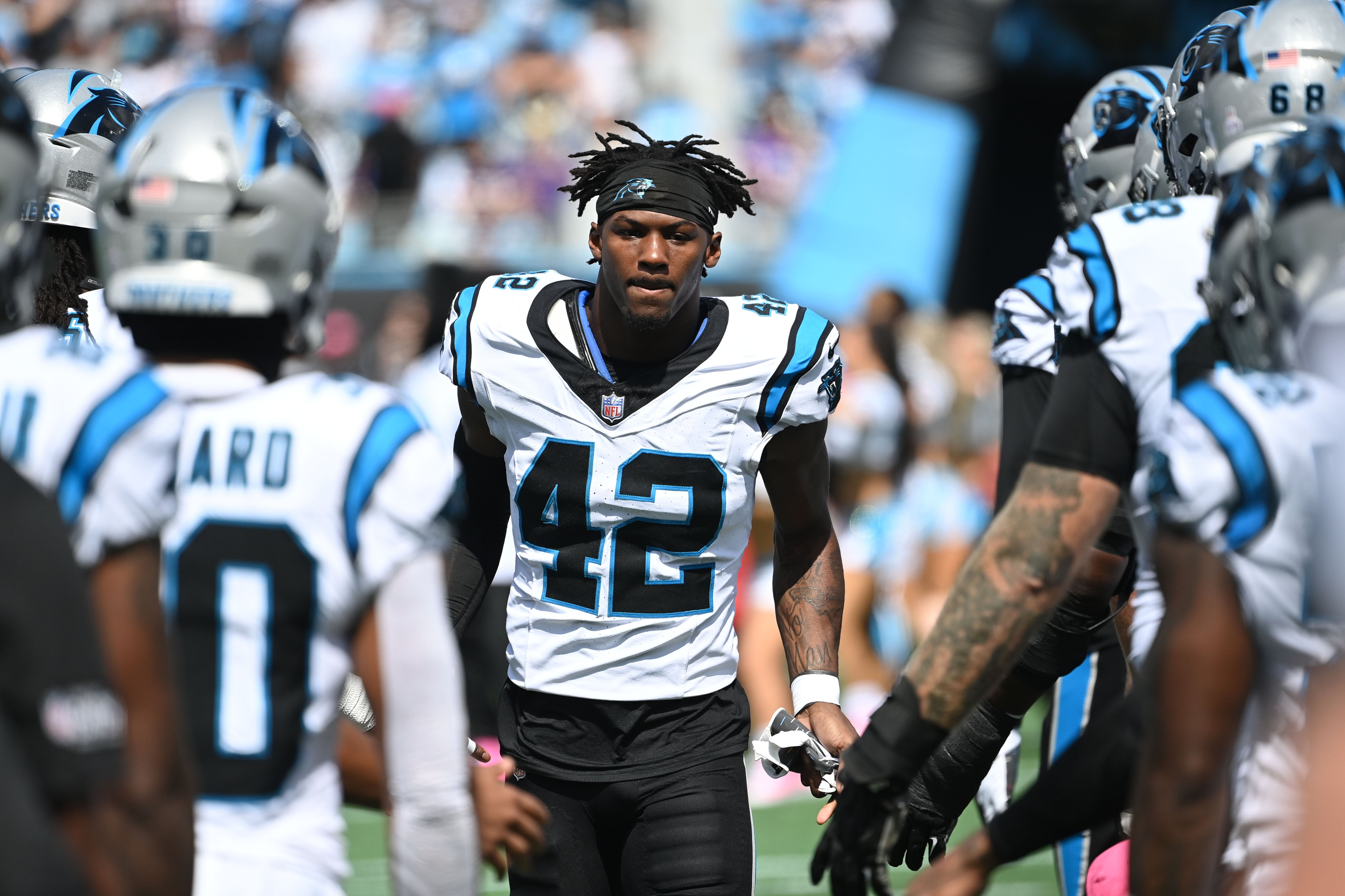 Oct 1, 2023; Charlotte, North Carolina, USA; Carolina Panthers safety Sam Franklin Jr. (42) runs on to the field at Bank of America Stadium. Mandatory Credit: Bob Donnan-USA TODAY Sports