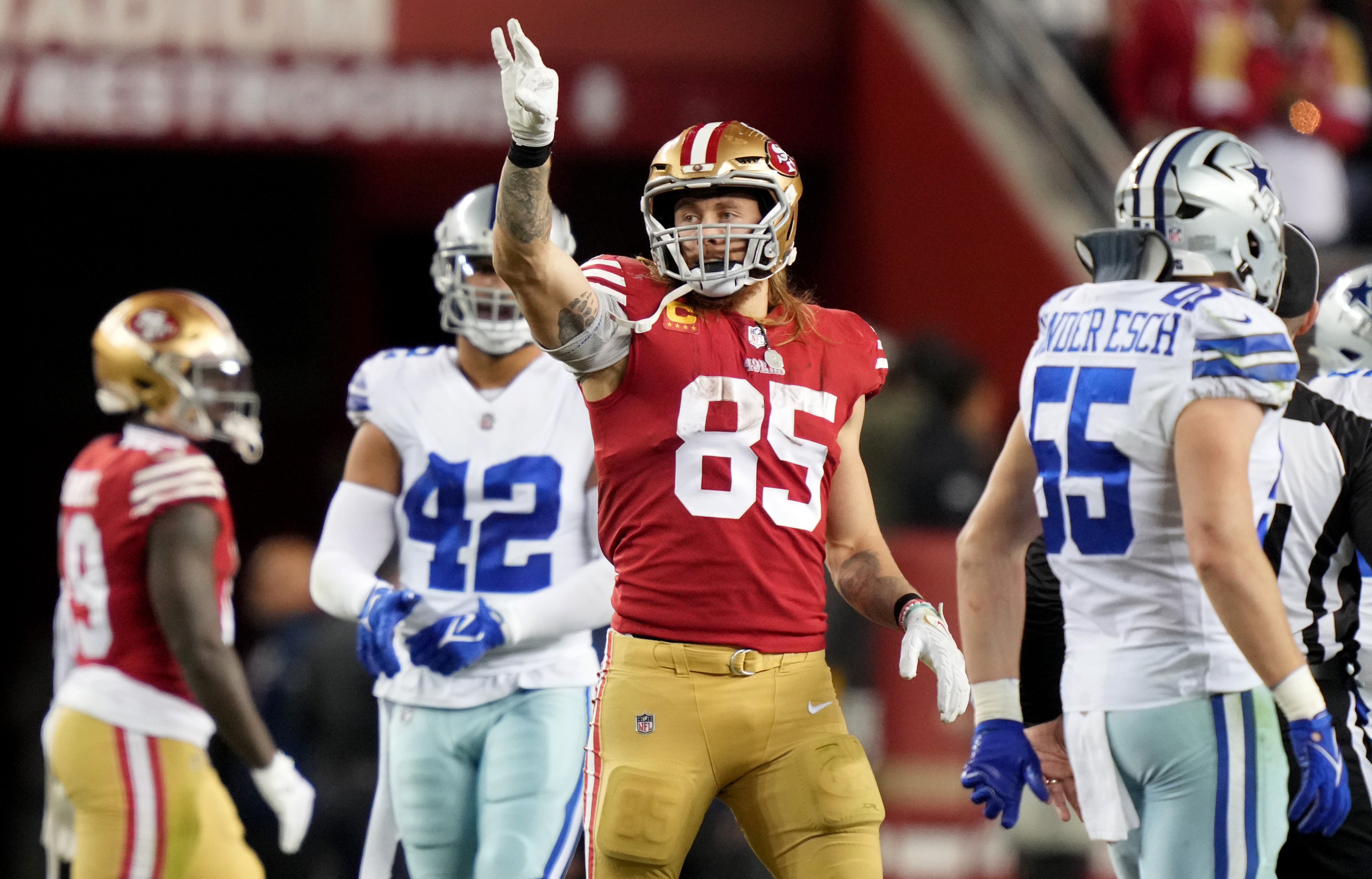 Jan 22, 2023; Santa Clara, California, USA; San Francisco 49ers tight end George Kittle (85) celebrates after a play during the fourth quarter of a NFC divisional round game against the Dallas Cowboys at Levi's Stadium.