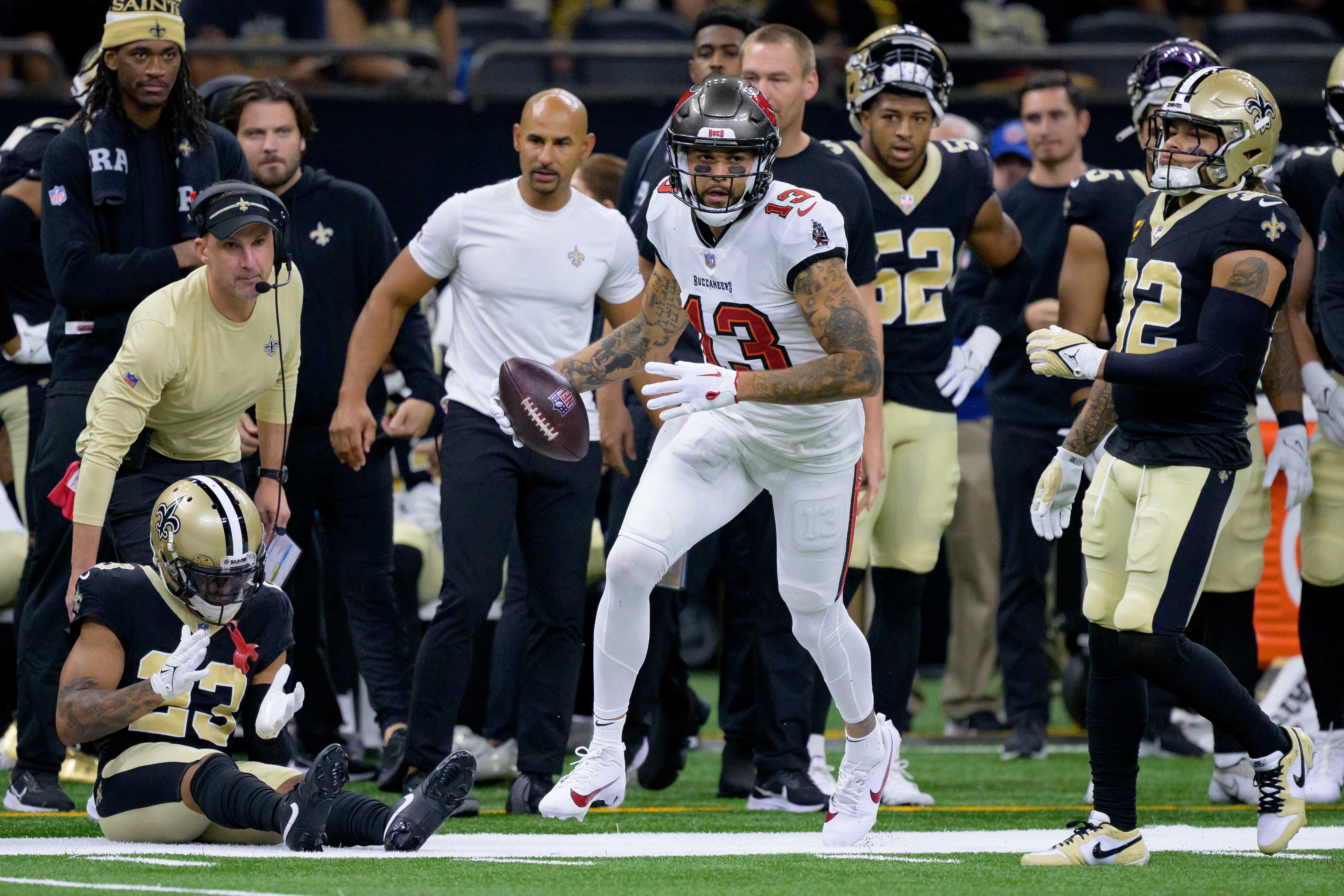 Oct 1, 2023; New Orleans, Louisiana, USA; New Orleans Saints wide receiver Michael Thomas (13) gets up after a reception against the New Orleans Saints during the second quarter at the Caesars Superdome. Mandatory Credit: Matthew Hinton-USA TODAY Sports