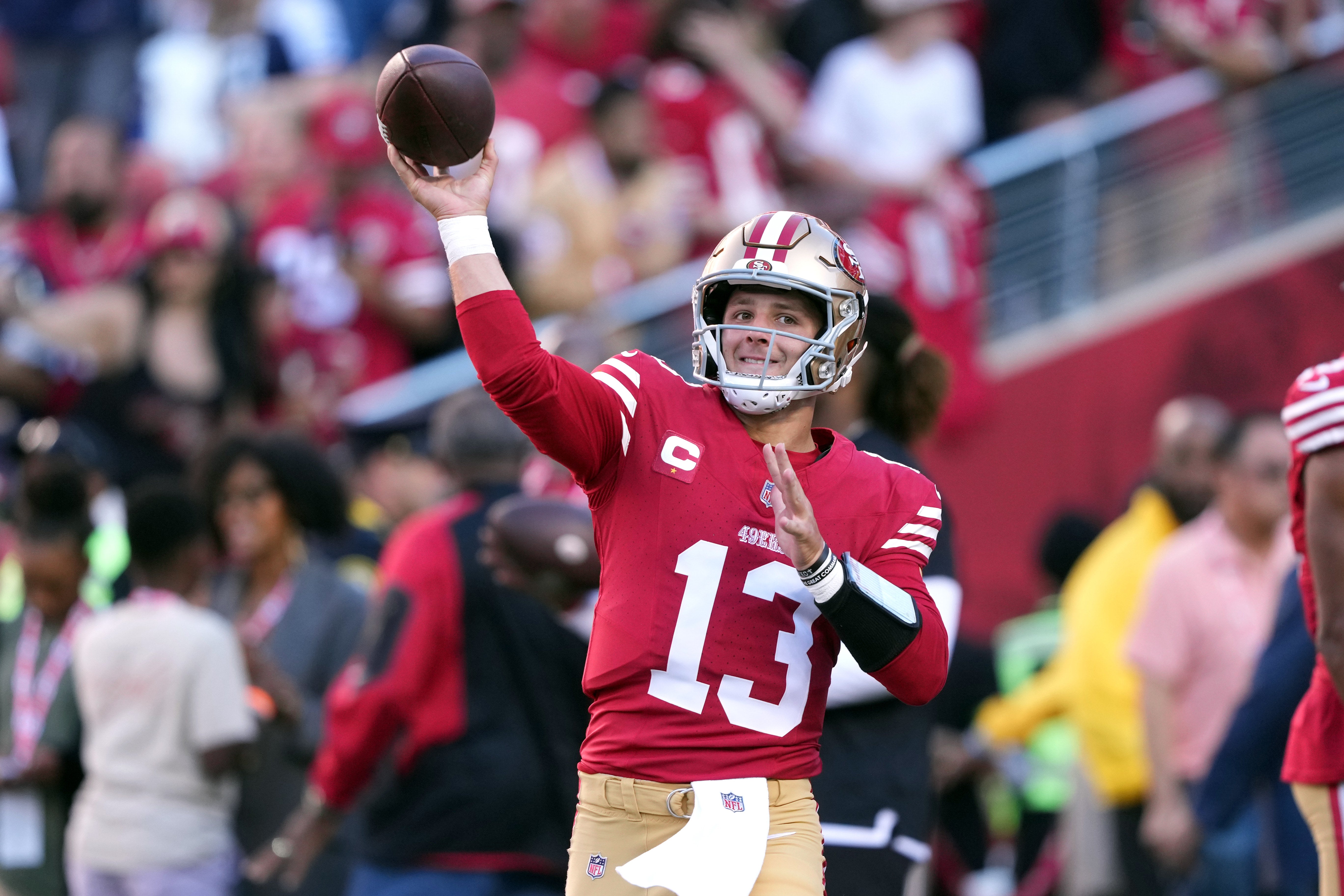 Oct 8, 2023; Santa Clara, California, USA; San Francisco 49ers quarterback Brock Purdy (13) warms up before the game against the Dallas Cowboys at Levi's Stadium.