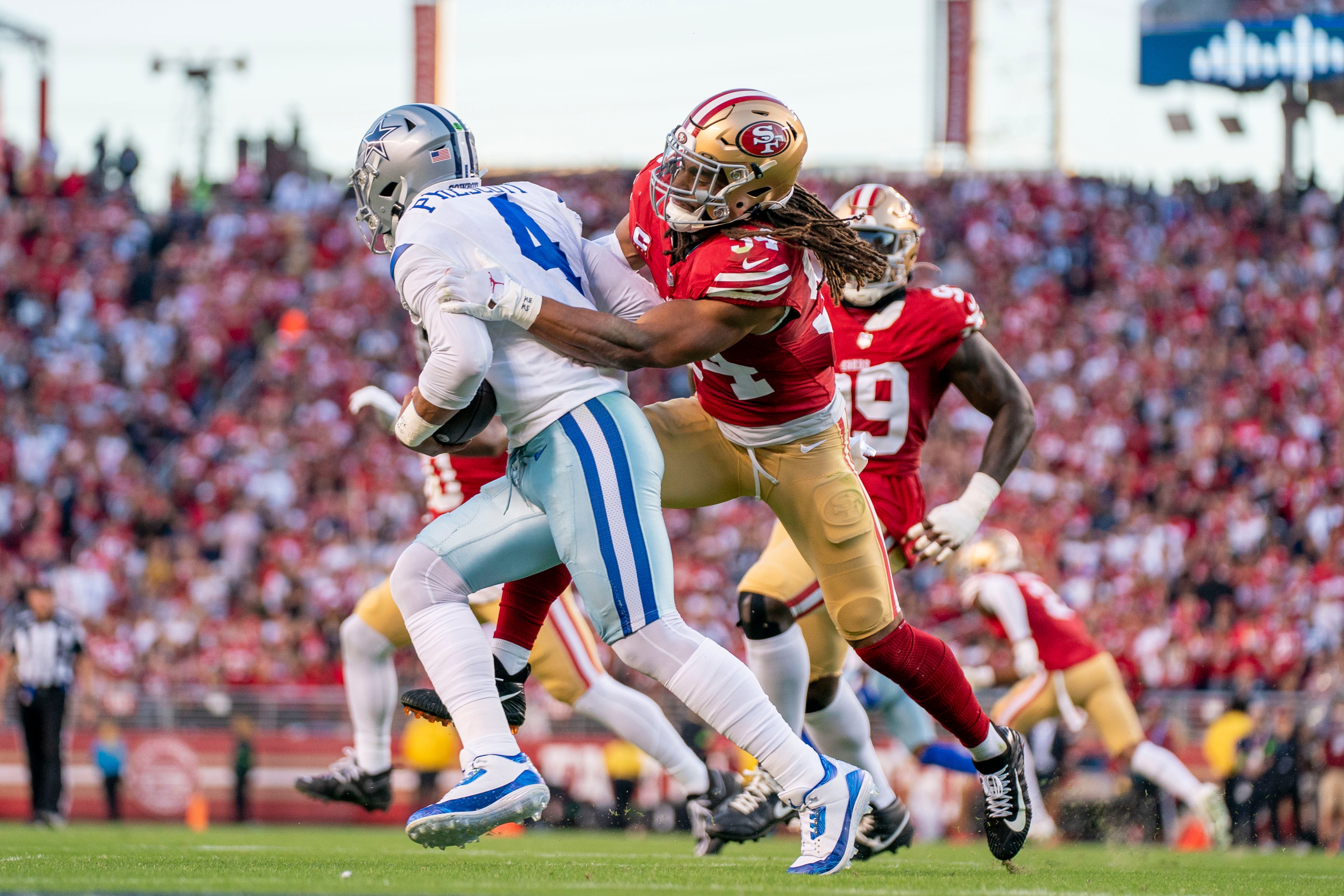San Francisco 49ers linebacker Fred Warner (54) sacks Dallas Cowboys quarterback Dak Prescott (4) during the second quarter at Levi's Stadium. Mandatory Credit: Kyle Terada-USA TODAY Sports