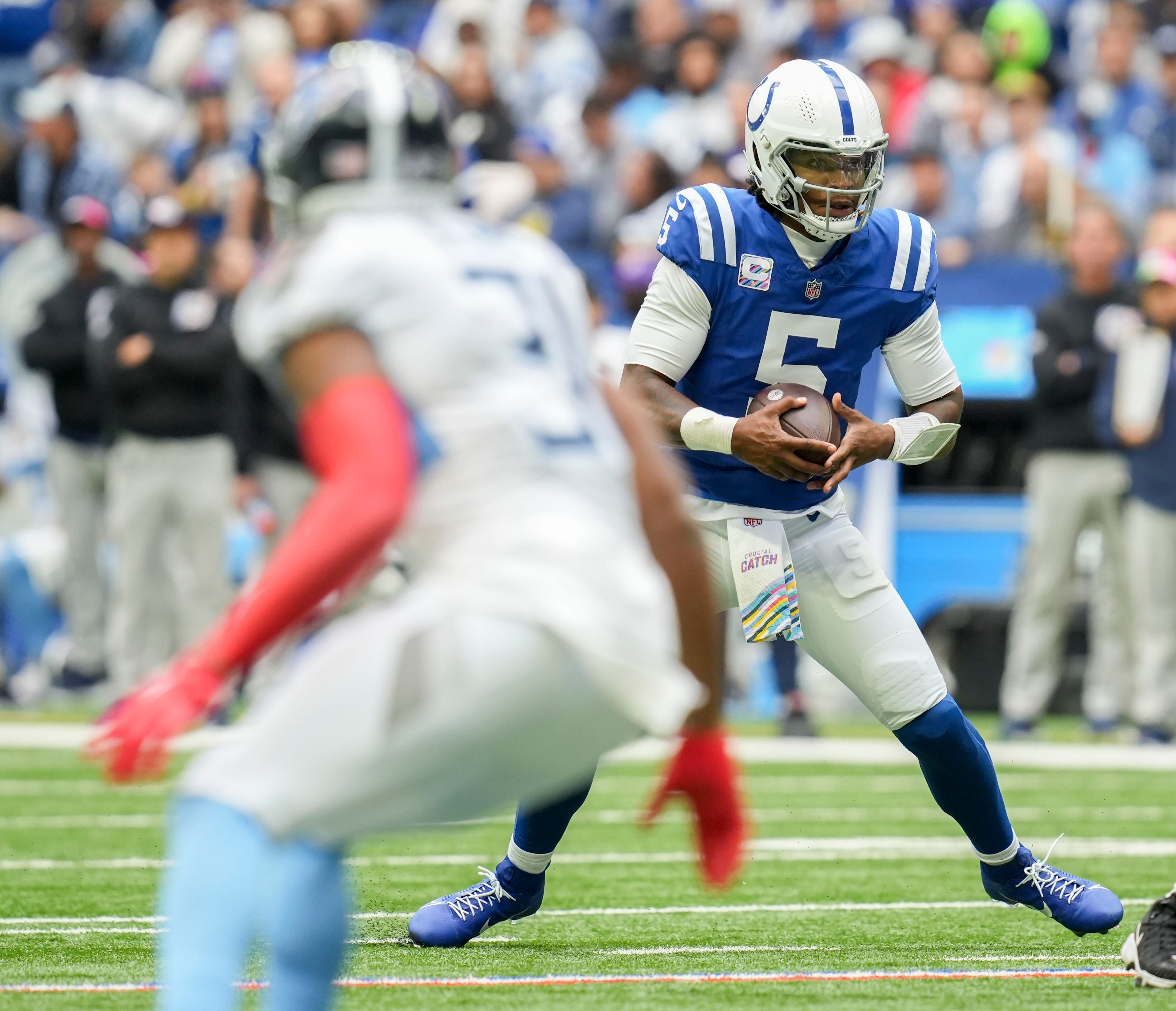 Indianapolis Colts quarterback Anthony Richardson (5) moves with the ball Sunday, Oct. 8, 2023, during a game against the Tennessee Titans at Lucas Oil Stadium in Indianapolis.